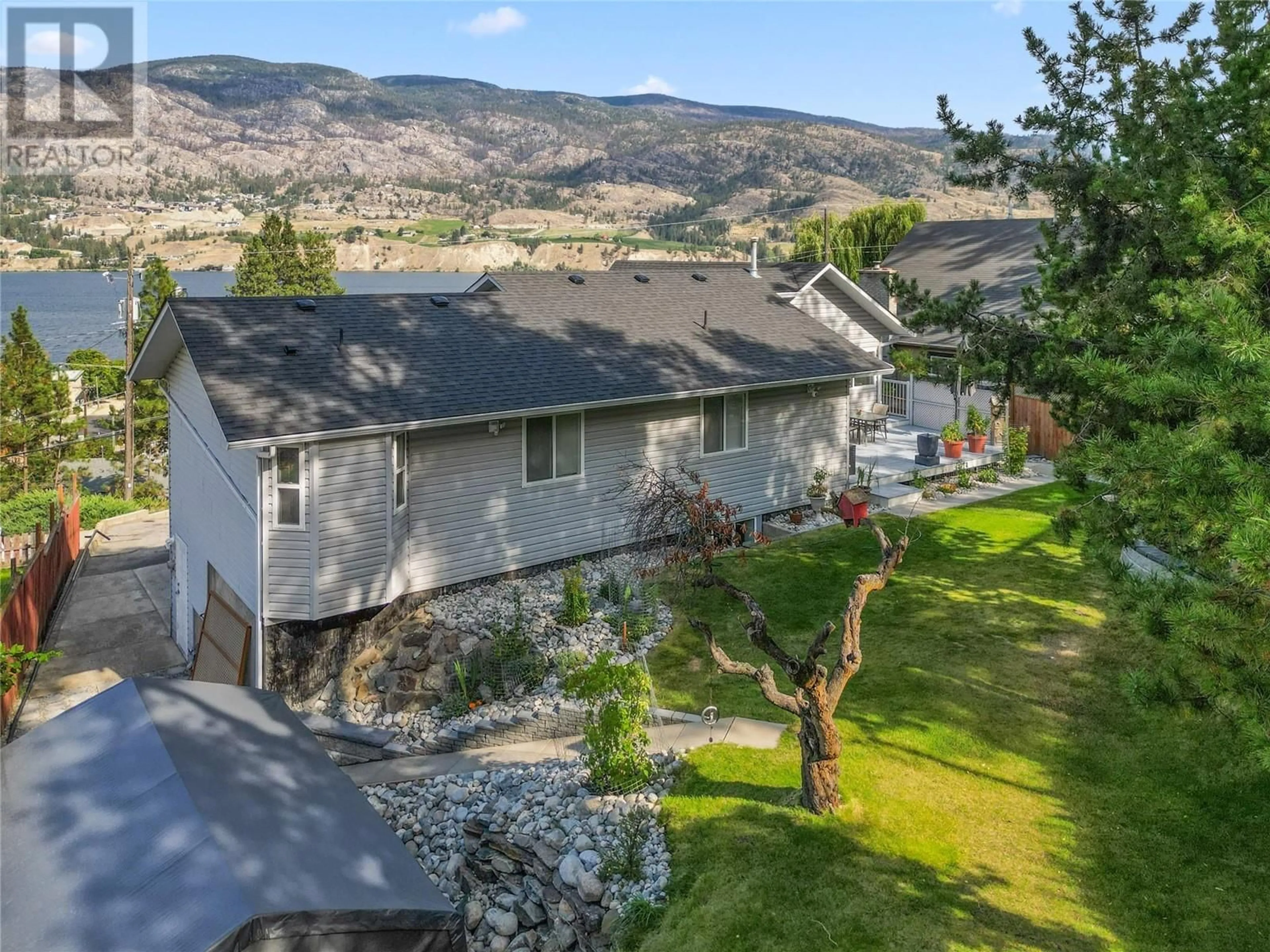 A pic from outside/outdoor area/front of a property/back of a property/a pic from drone, mountain view for 114 Oak Avenue, Kaleden British Columbia V0H1K0