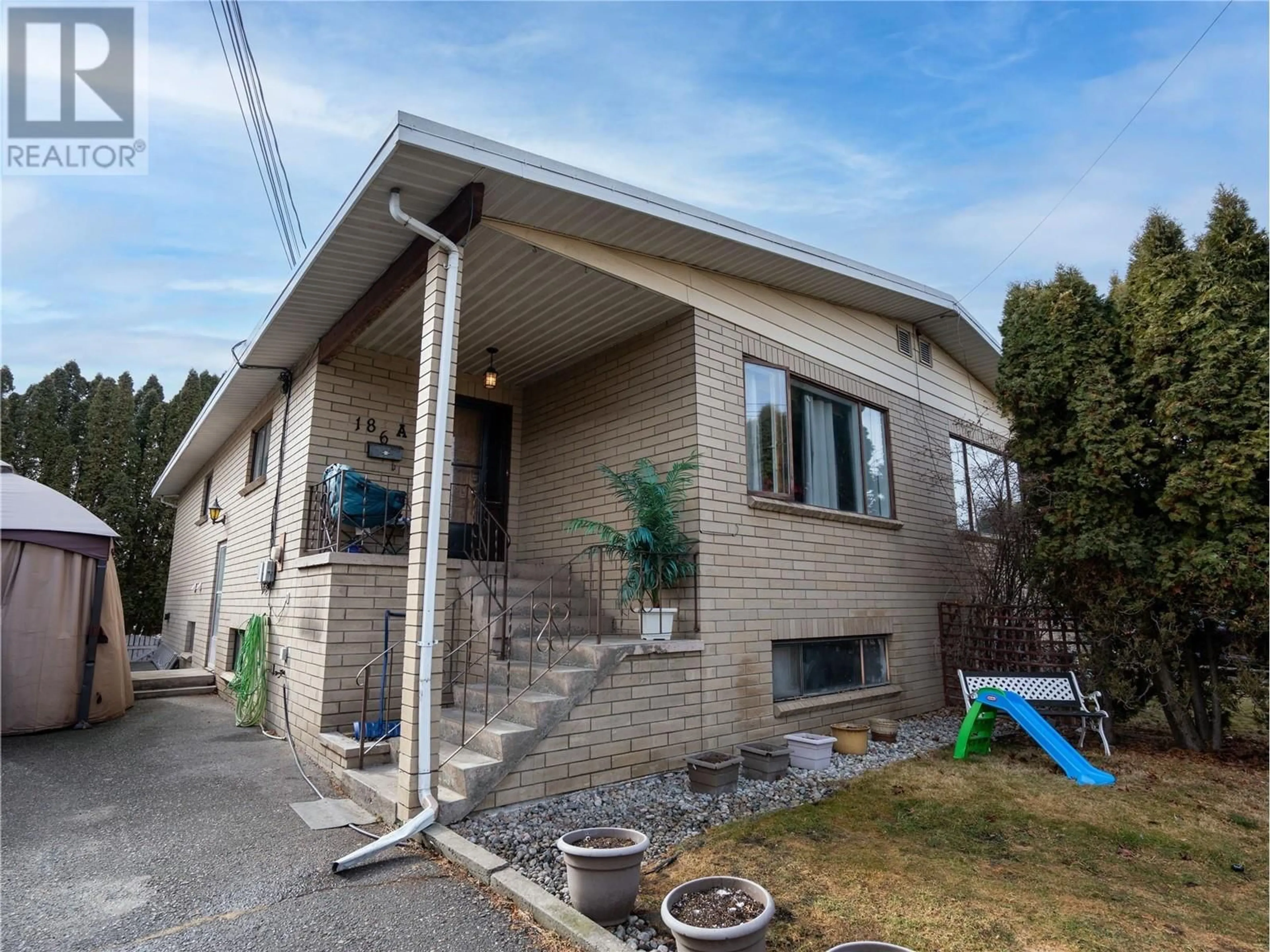 Home with brick exterior material, street for 186 WATERFORD AVENUE, Penticton British Columbia V2A3T7