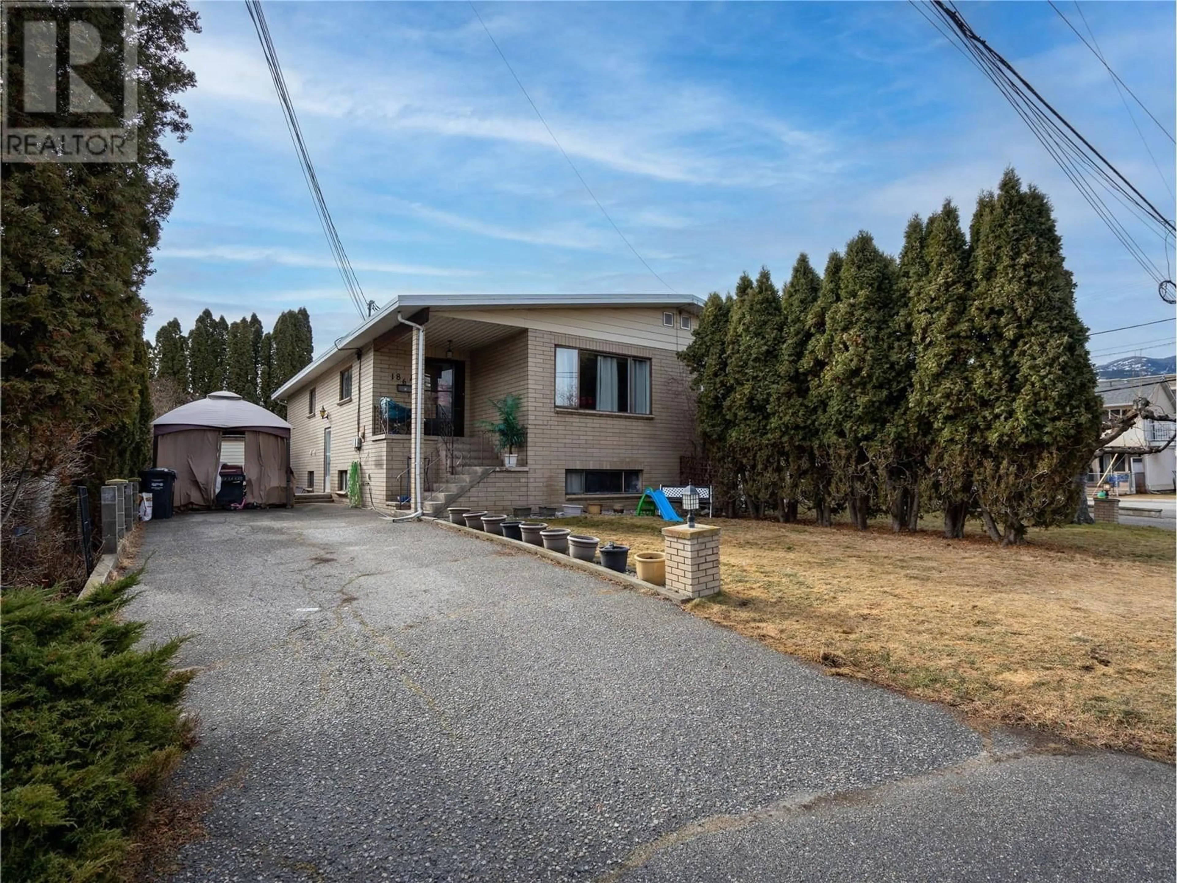 A pic from outside/outdoor area/front of a property/back of a property/a pic from drone, street for 186 Waterford Avenue, Penticton British Columbia V2A3T7