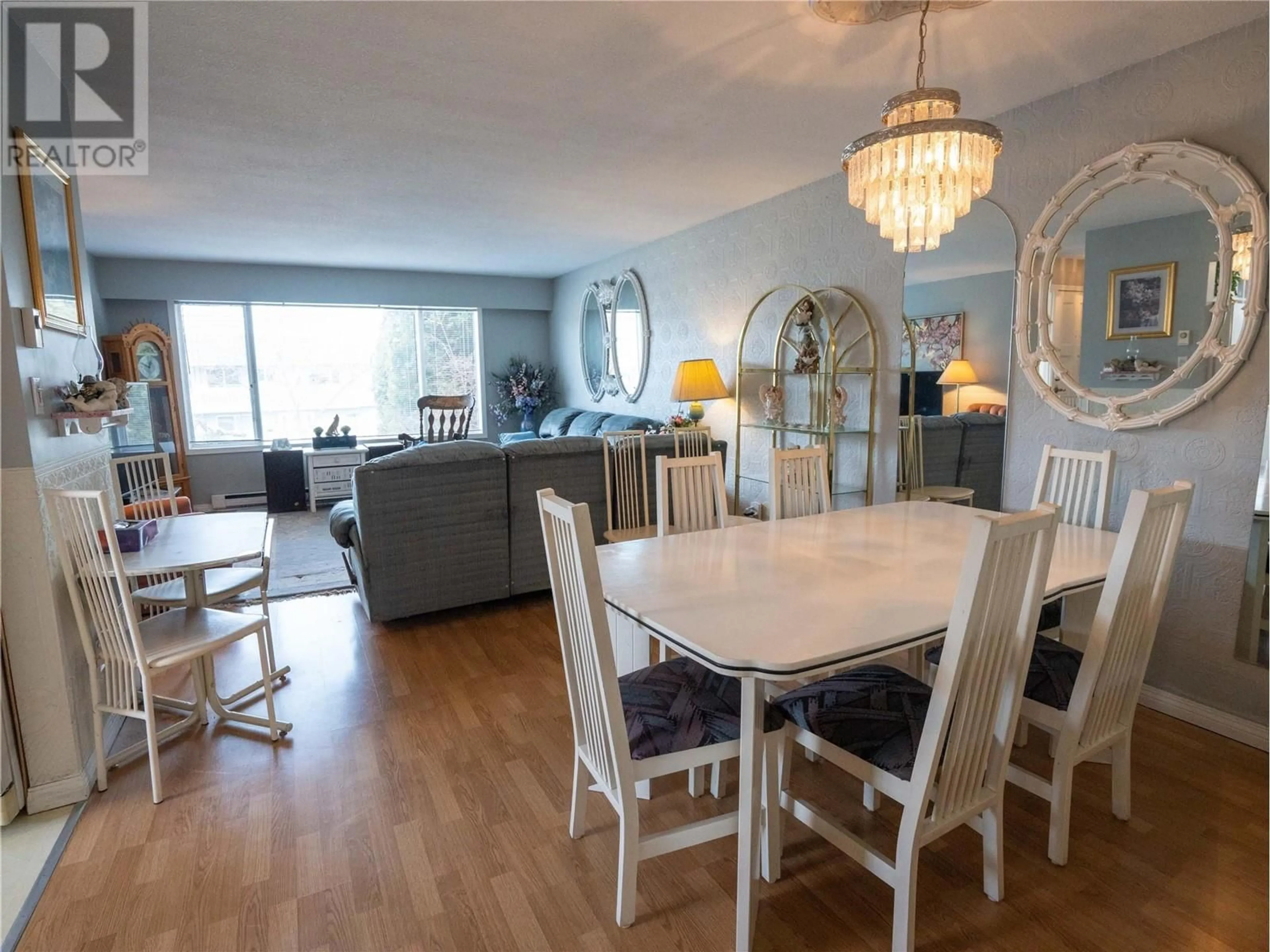 Dining room, wood/laminate floor for 196 Waterford Avenue, Penticton British Columbia V2A3T7