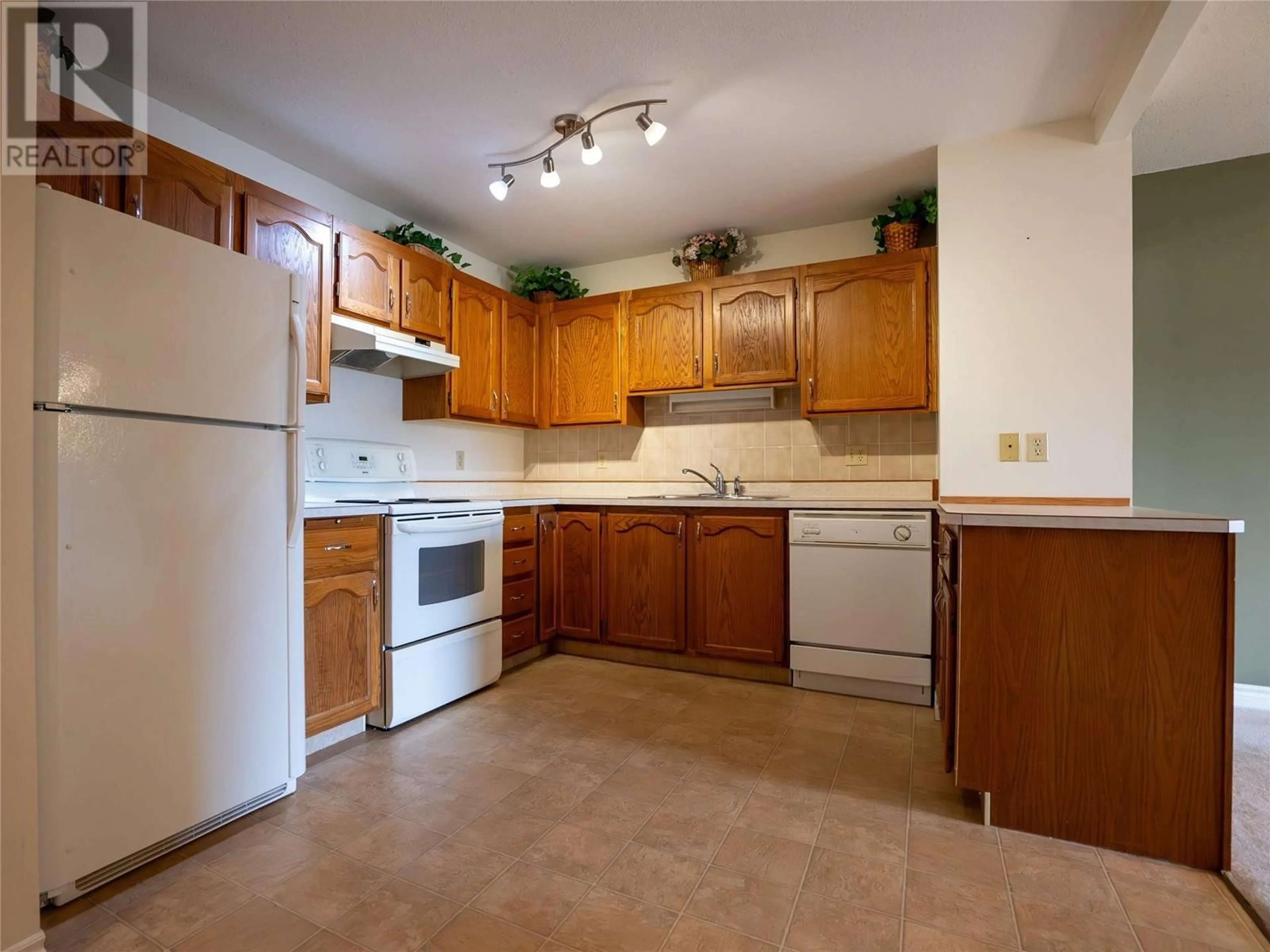 Standard kitchen, unknown for 301 - 1820 ATKINSON STREET, Penticton British Columbia V2A7M6