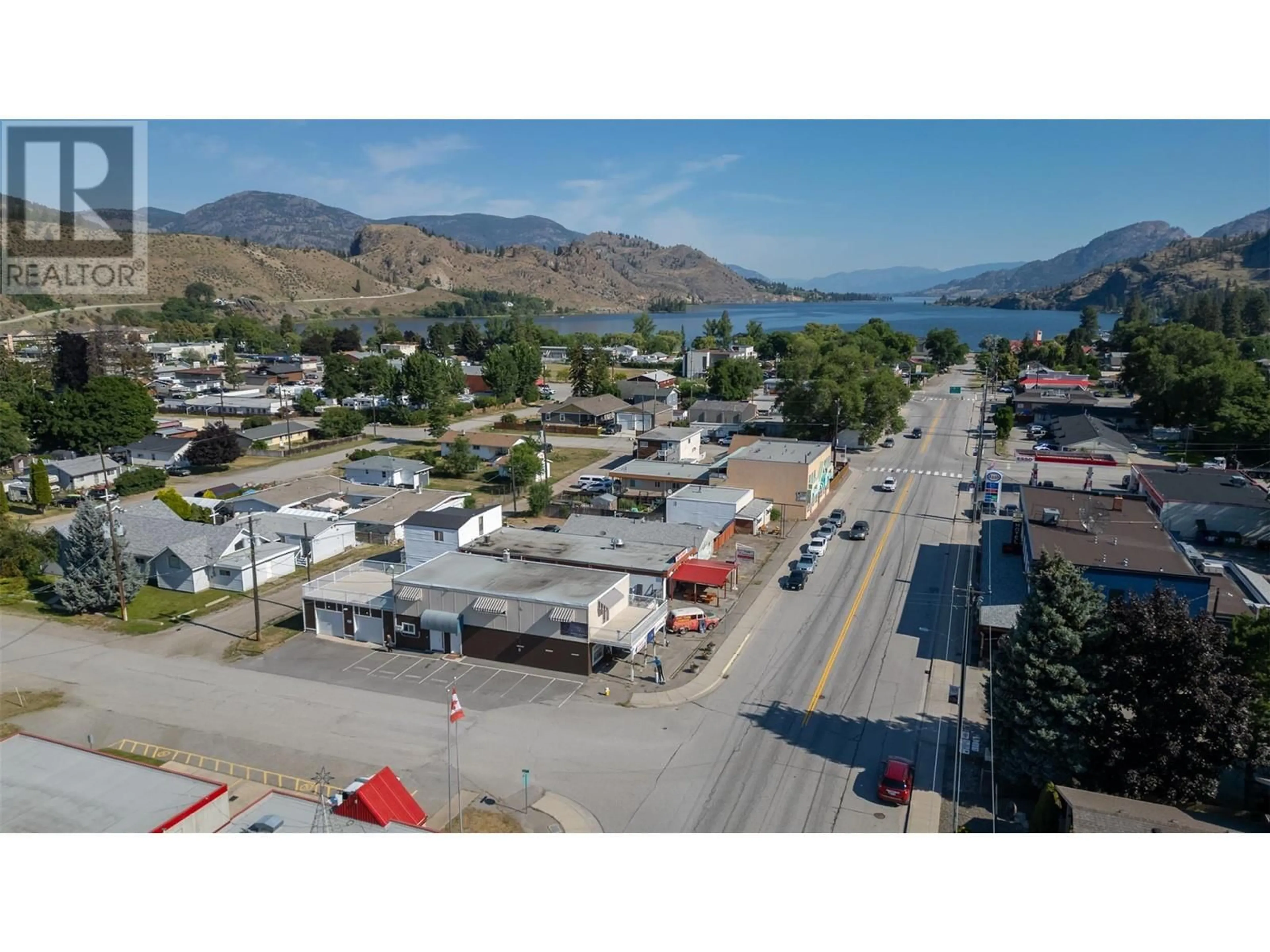 A pic from outside/outdoor area/front of a property/back of a property/a pic from drone, mountain view for 1032/1040 Main Street, Okanagan Falls British Columbia V0H1R4