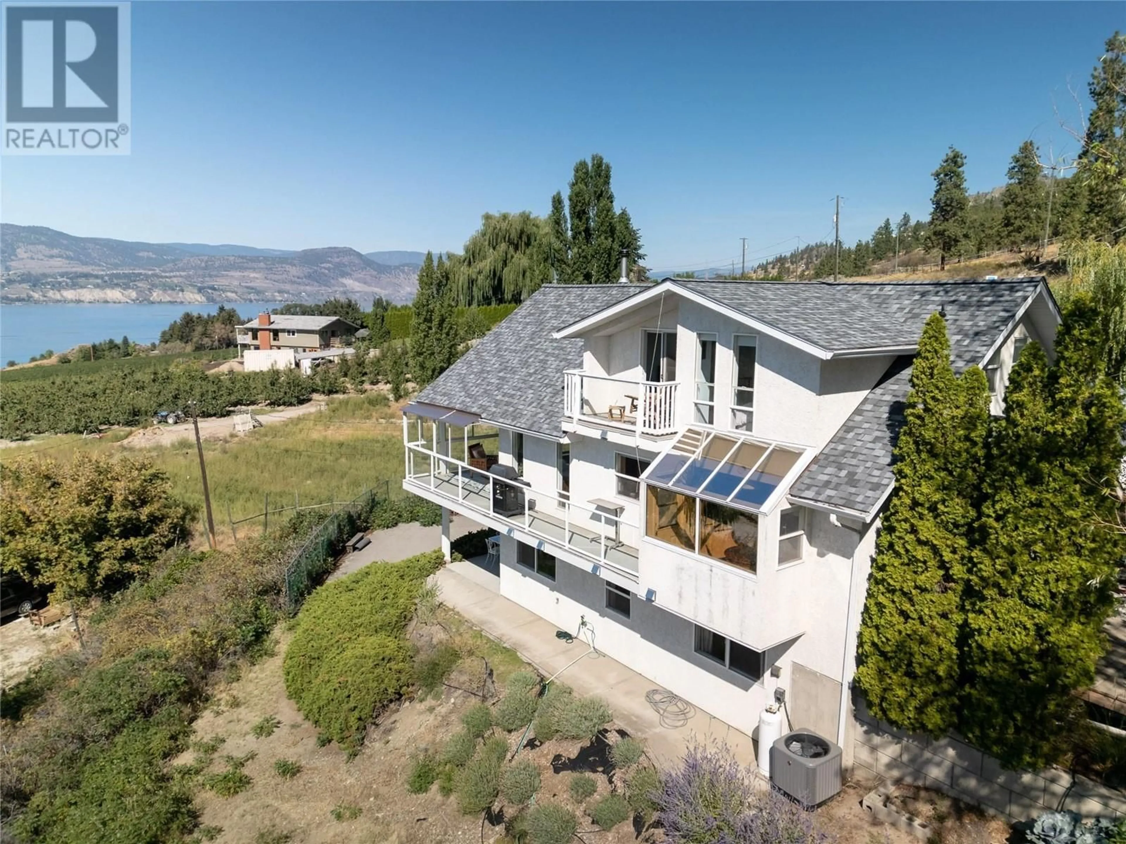 A pic from outside/outdoor area/front of a property/back of a property/a pic from drone, water/lake/river/ocean view for 4295 NORTH NARAMATA ROAD, Naramata British Columbia V0H1N1
