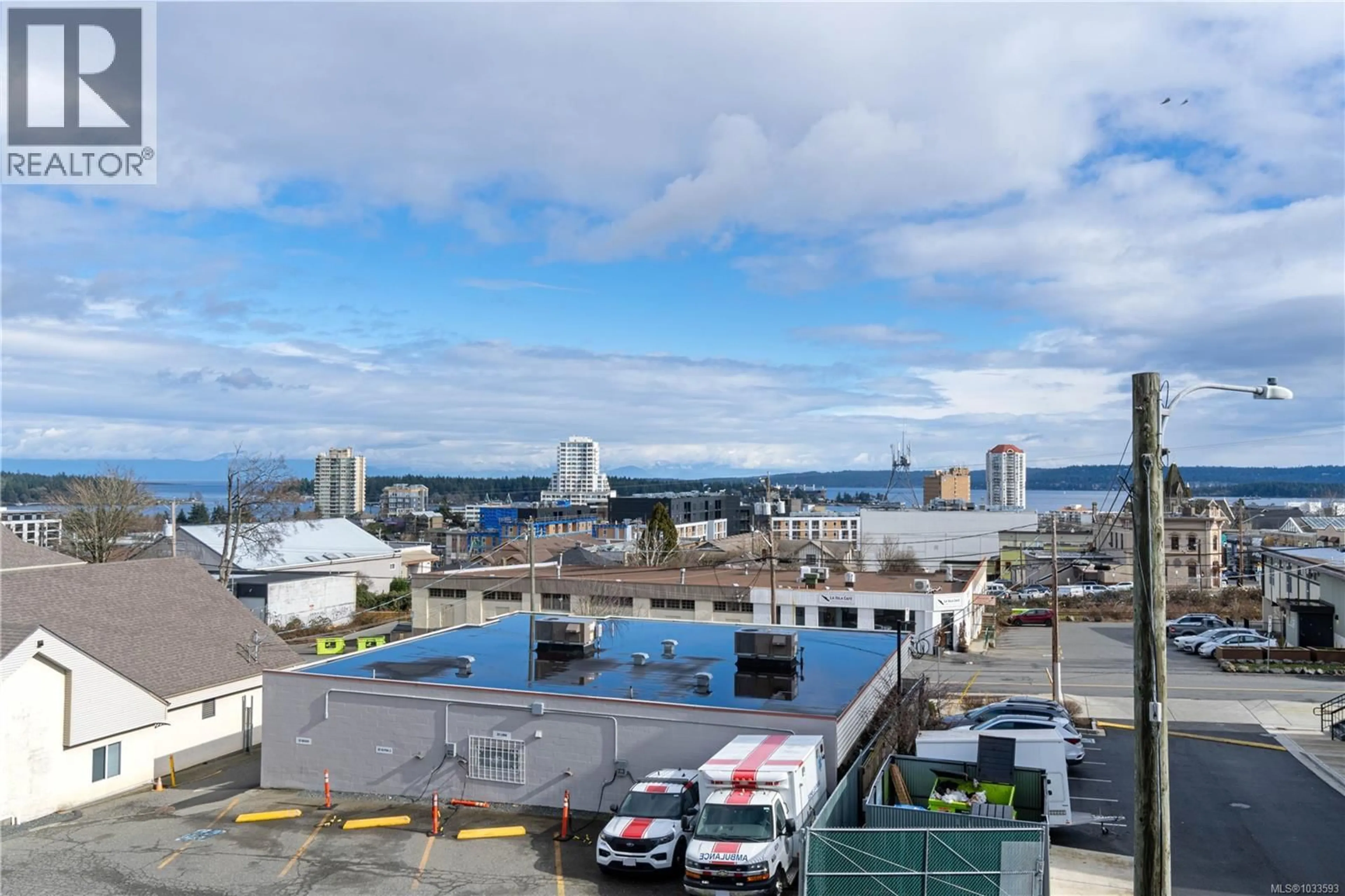 A pic from outside/outdoor area/front of a property/back of a property/a pic from drone, water/lake/river/ocean view for 405 - 240 MILTON STREET, Nanaimo British Columbia V9R2K6