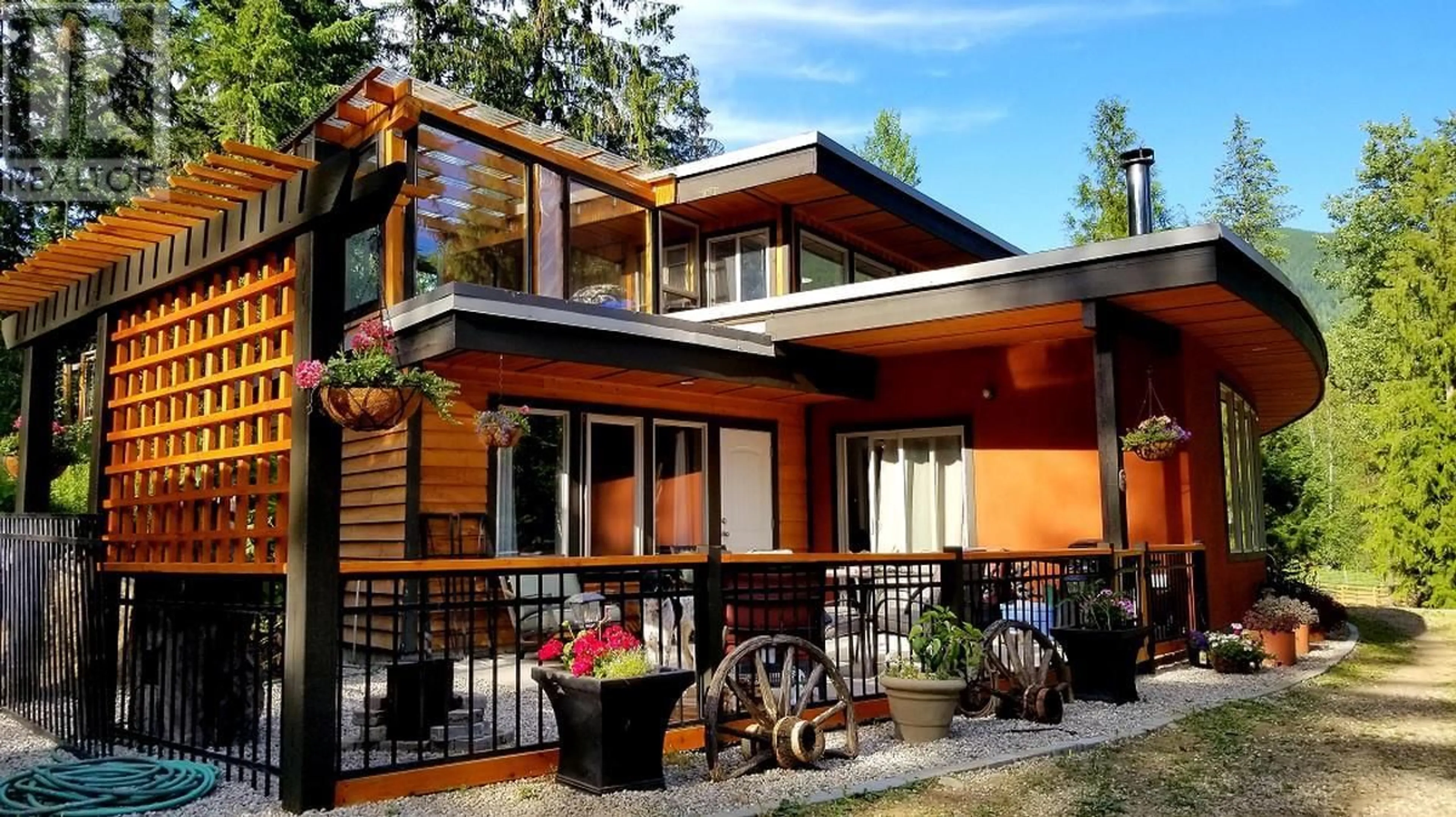 Home with vinyl exterior material, street for 216 ROSEBUD LAKE Road, Salmo British Columbia V0G1Z0