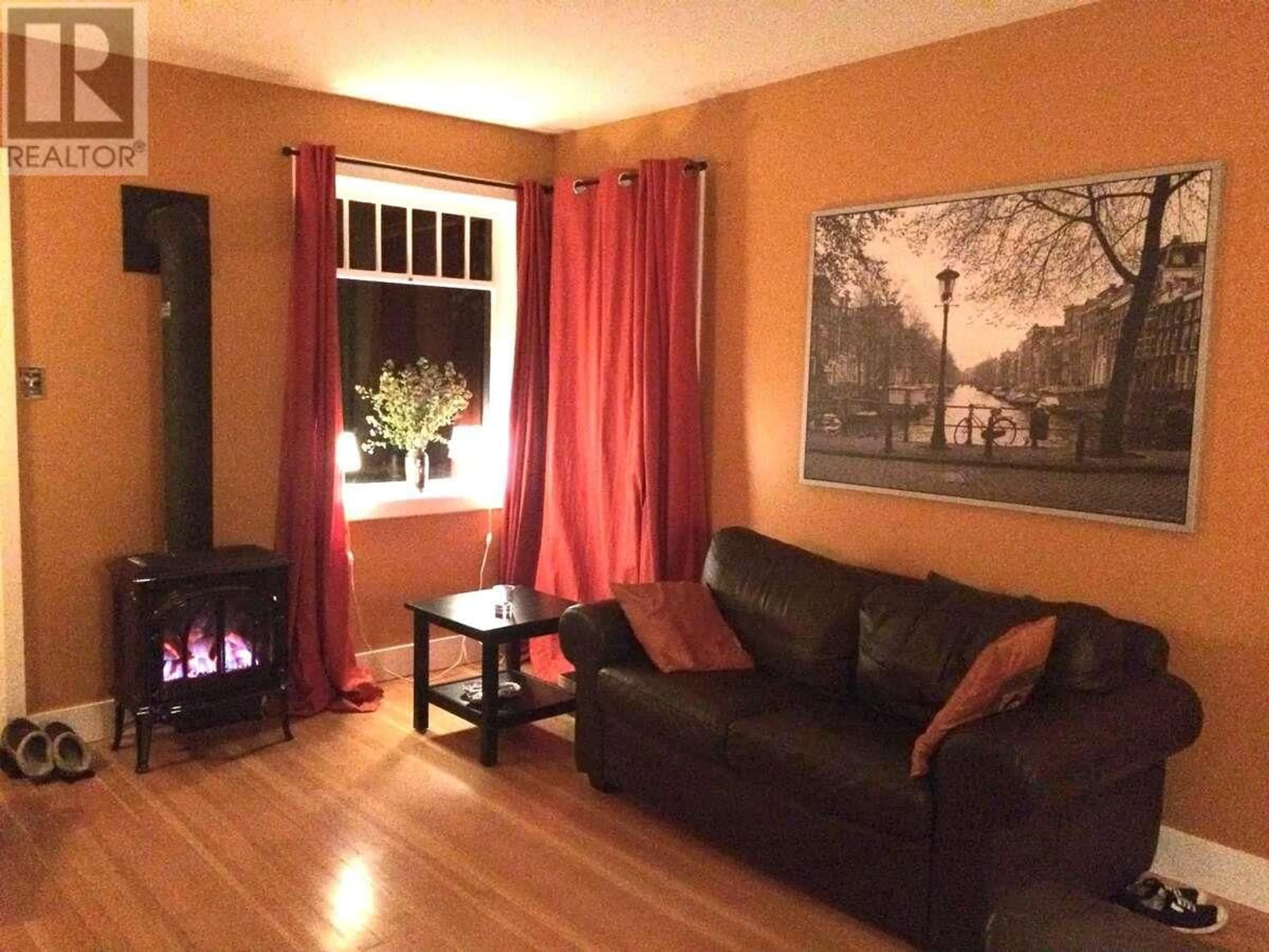 Living room with furniture, wood/laminate floor for 238 HIGH Street, Nelson British Columbia V1L5V7