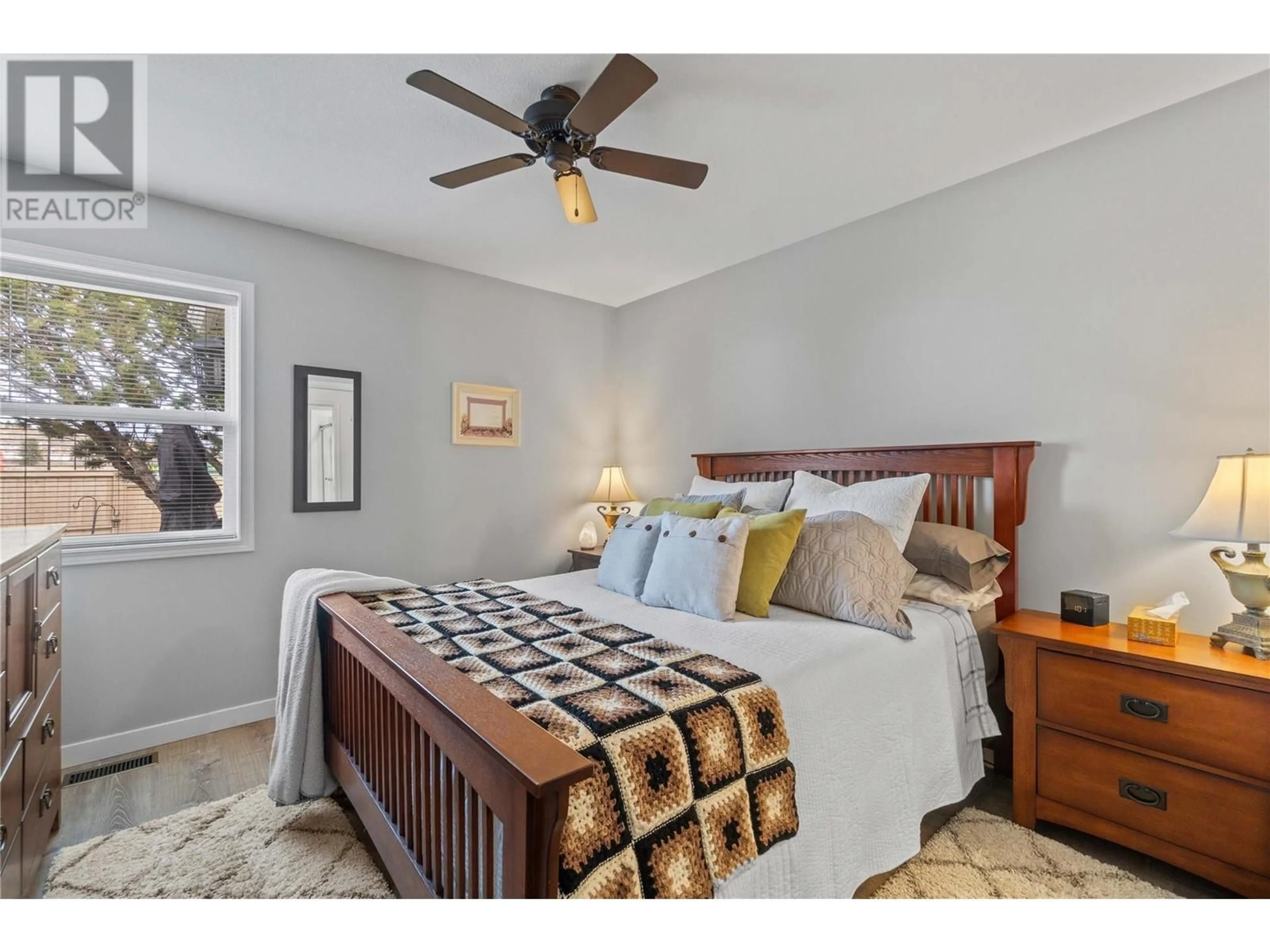 Bedroom with bed, wood/laminate floor for 14 - 2210 LOUIE DRIVE, West Kelowna British Columbia V4T2L7