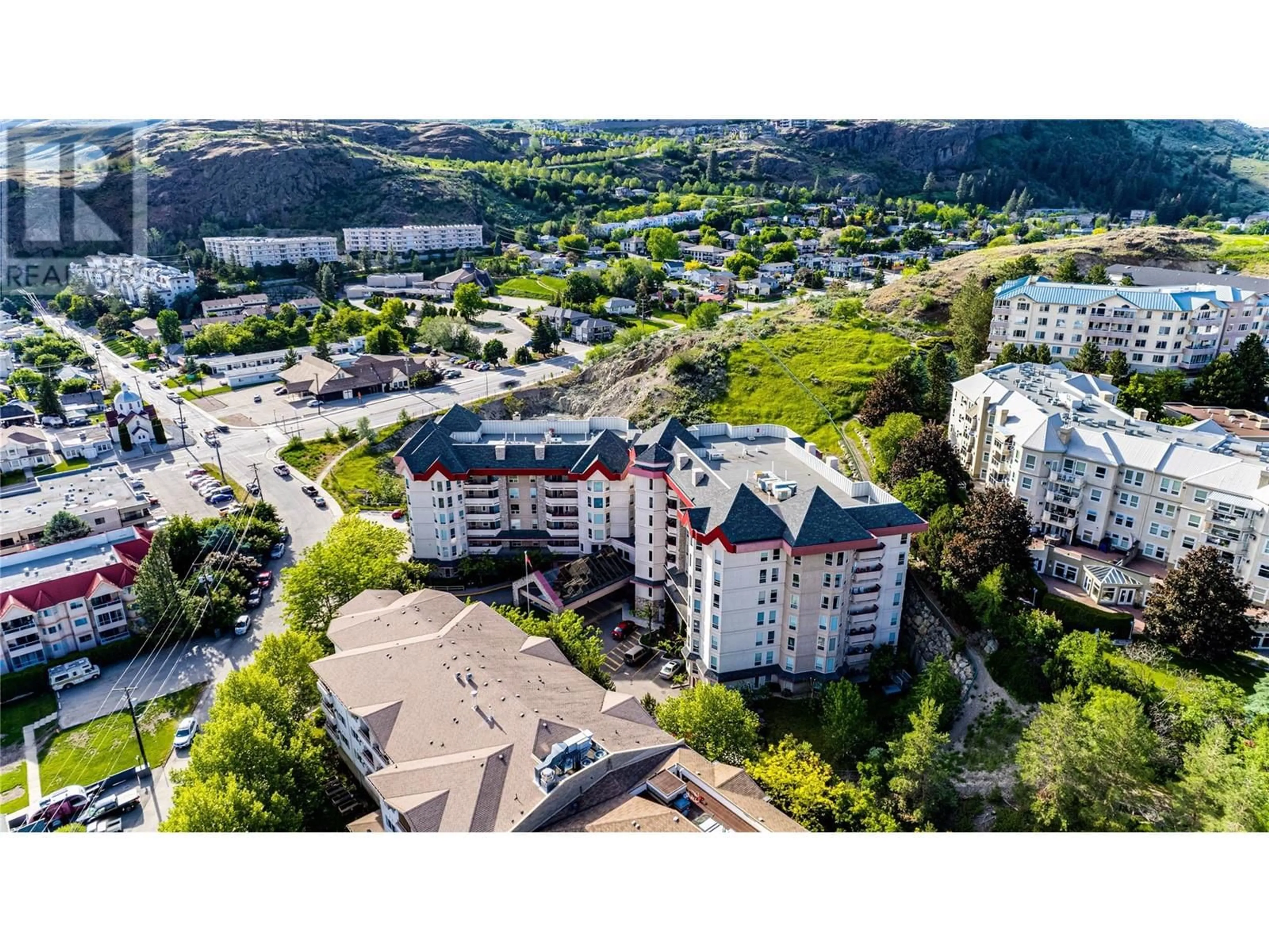 A pic from outside/outdoor area/front of a property/back of a property/a pic from drone, mountain view for 3011 Gateby Place Unit# 305, Vernon British Columbia V1T9S4