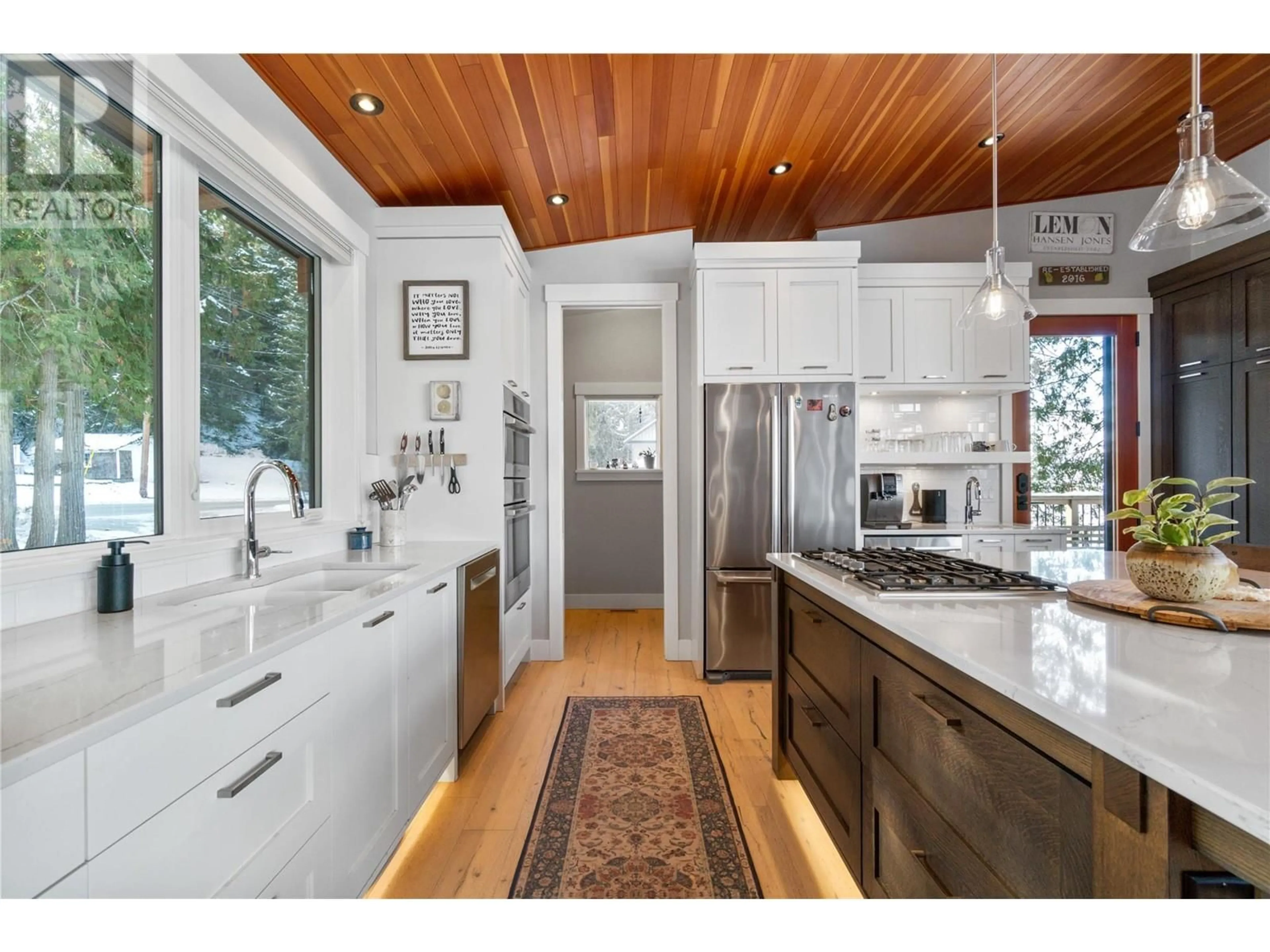 Open concept kitchen, wood/laminate floor for 4125 Eagle Bay Road, Eagle Bay British Columbia V0E1T0