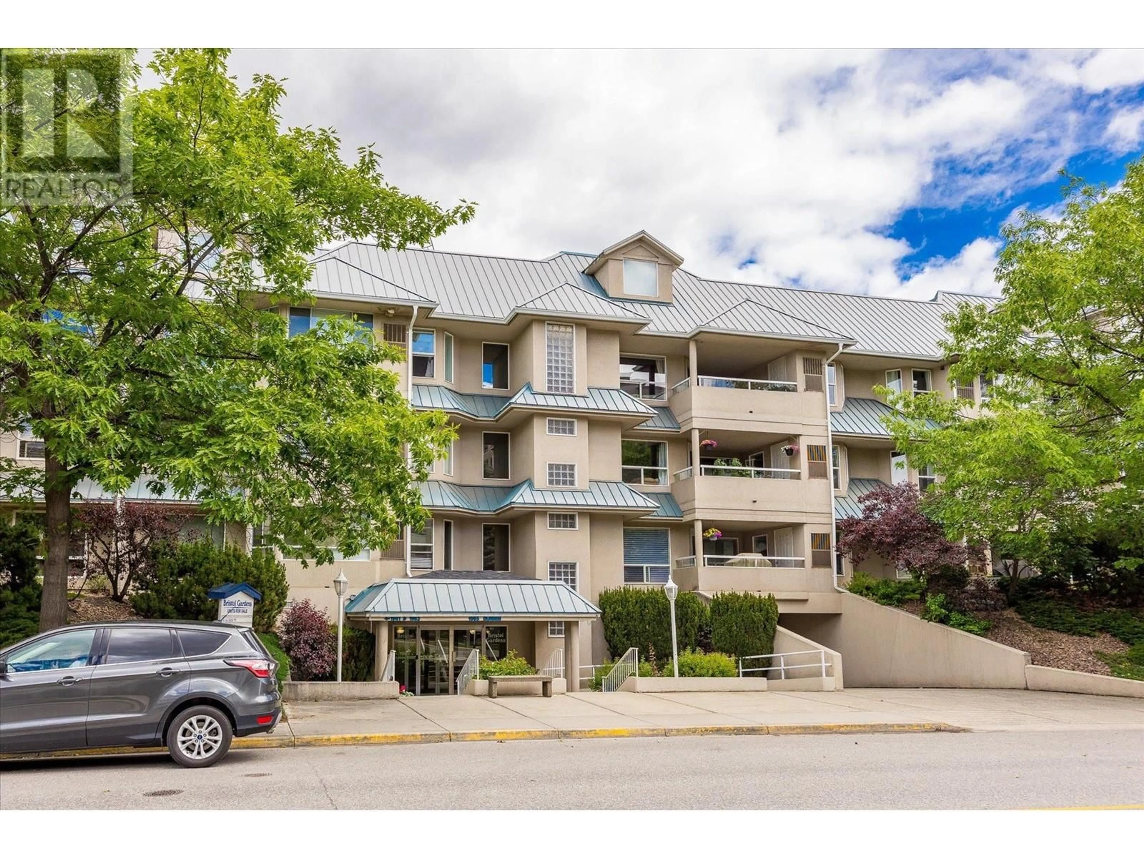 A pic from outside/outdoor area/front of a property/back of a property/a pic from drone, mountain view for 1965 Durnin Road Unit# 118, Kelowna British Columbia V1X7K6