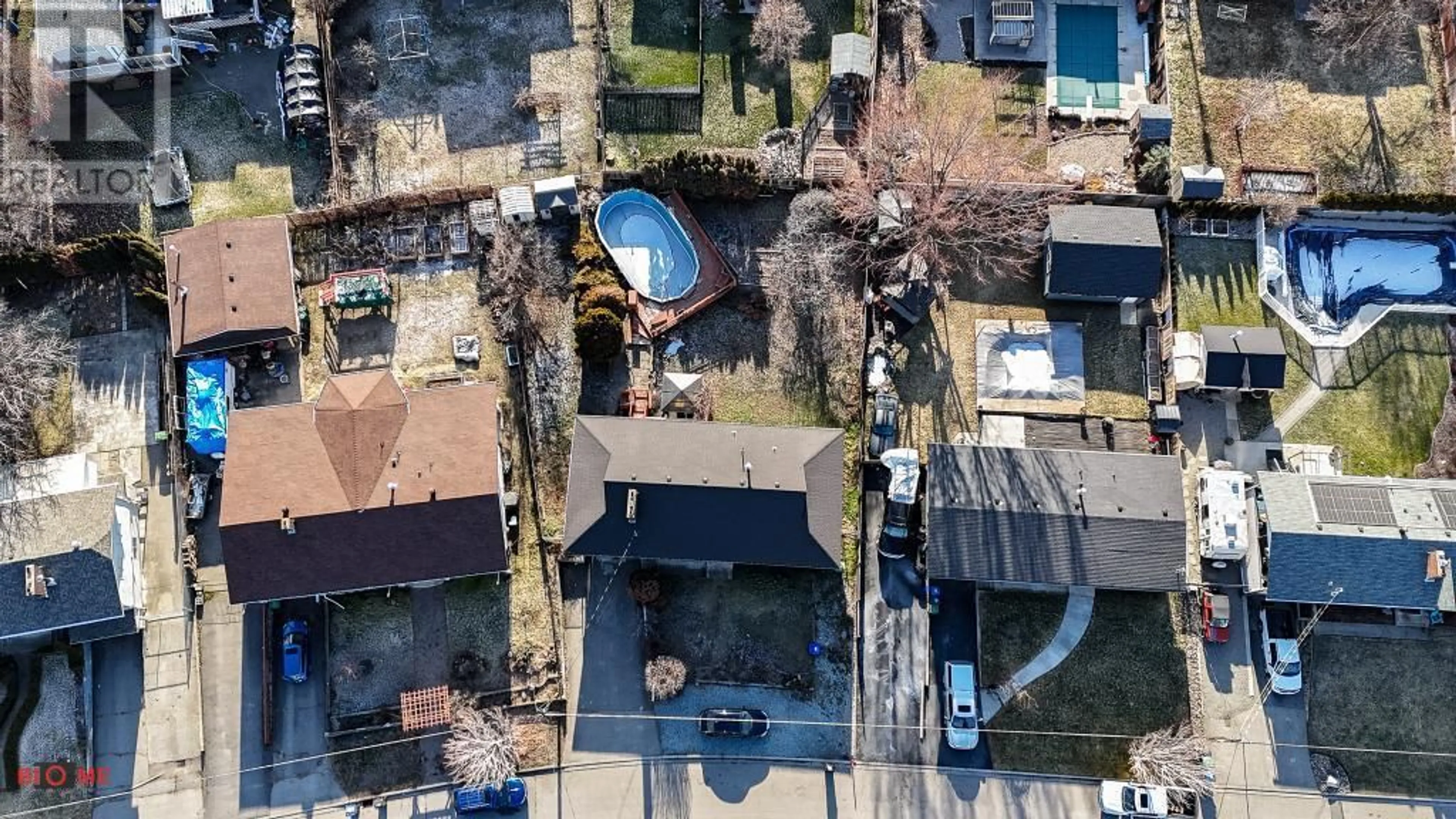 A pic from outside/outdoor area/front of a property/back of a property/a pic from drone, street for 1255 Thompson Road, Kelowna British Columbia V1X1C8