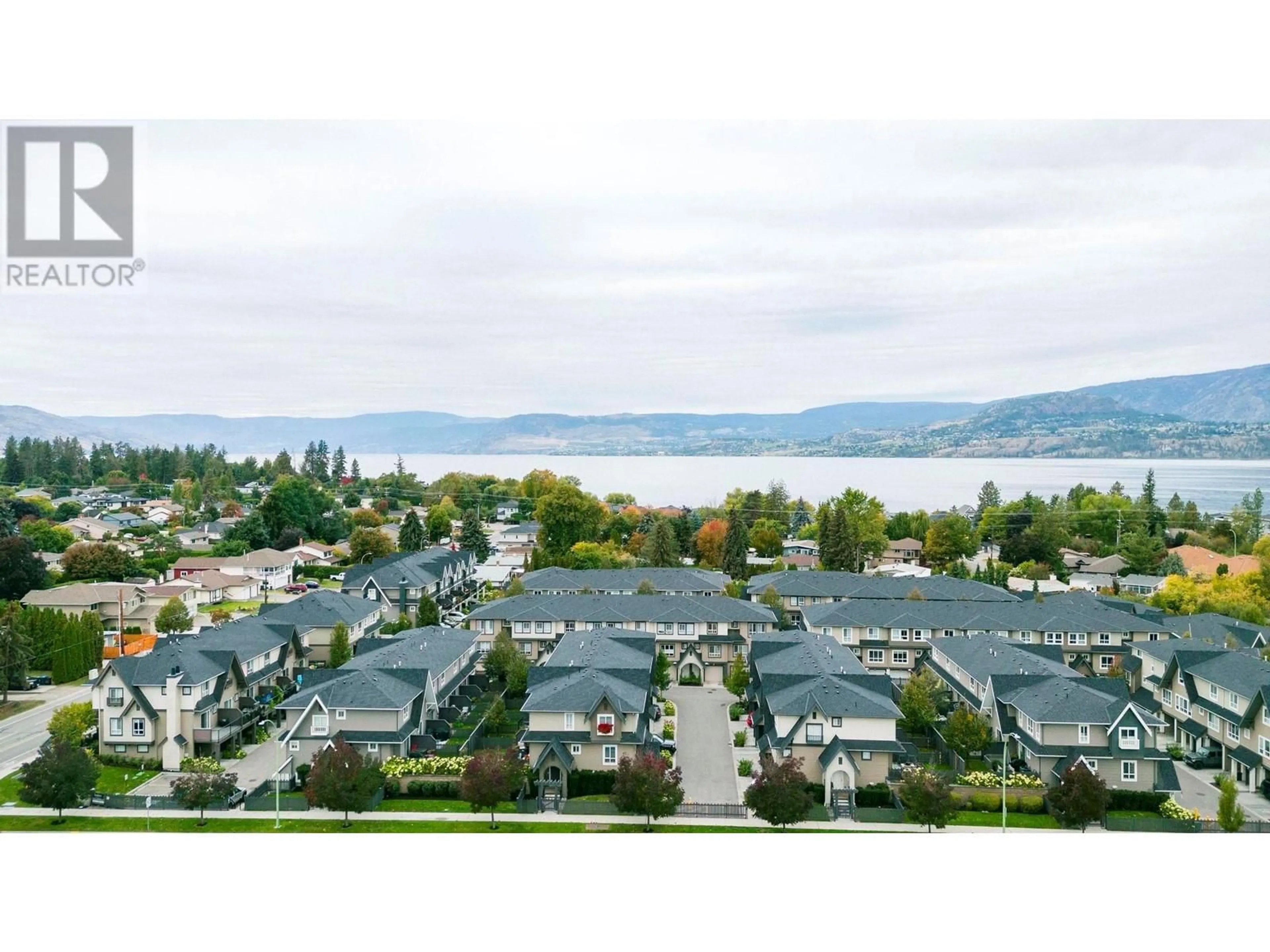 A pic from outside/outdoor area/front of a property/back of a property/a pic from drone, water/lake/river/ocean view for 680 Old Meadows Road Unit# 42, Kelowna British Columbia V1W5L4