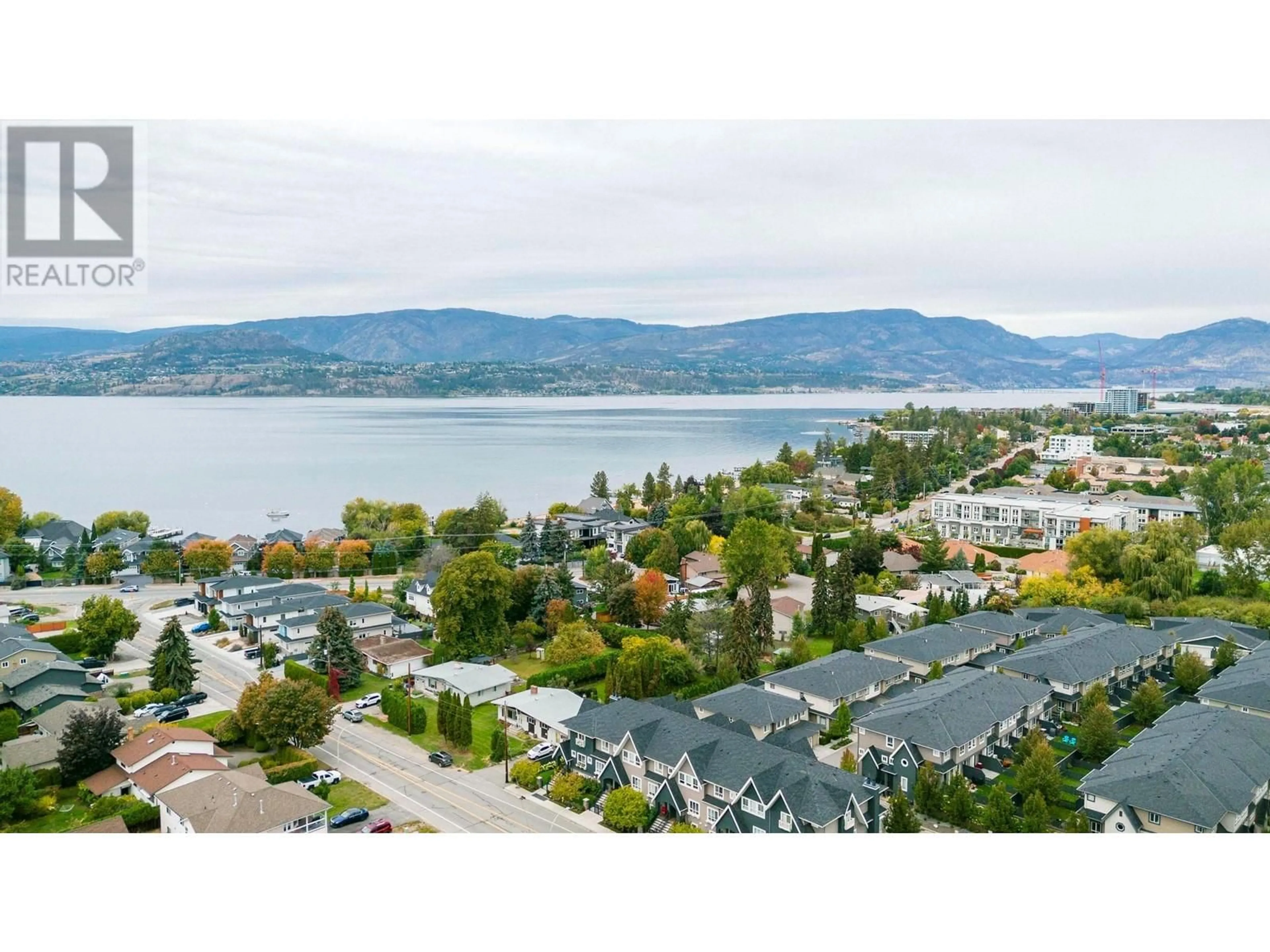 A pic from outside/outdoor area/front of a property/back of a property/a pic from drone, water/lake/river/ocean view for 680 Old Meadows Road Unit# 42, Kelowna British Columbia V1W5L4