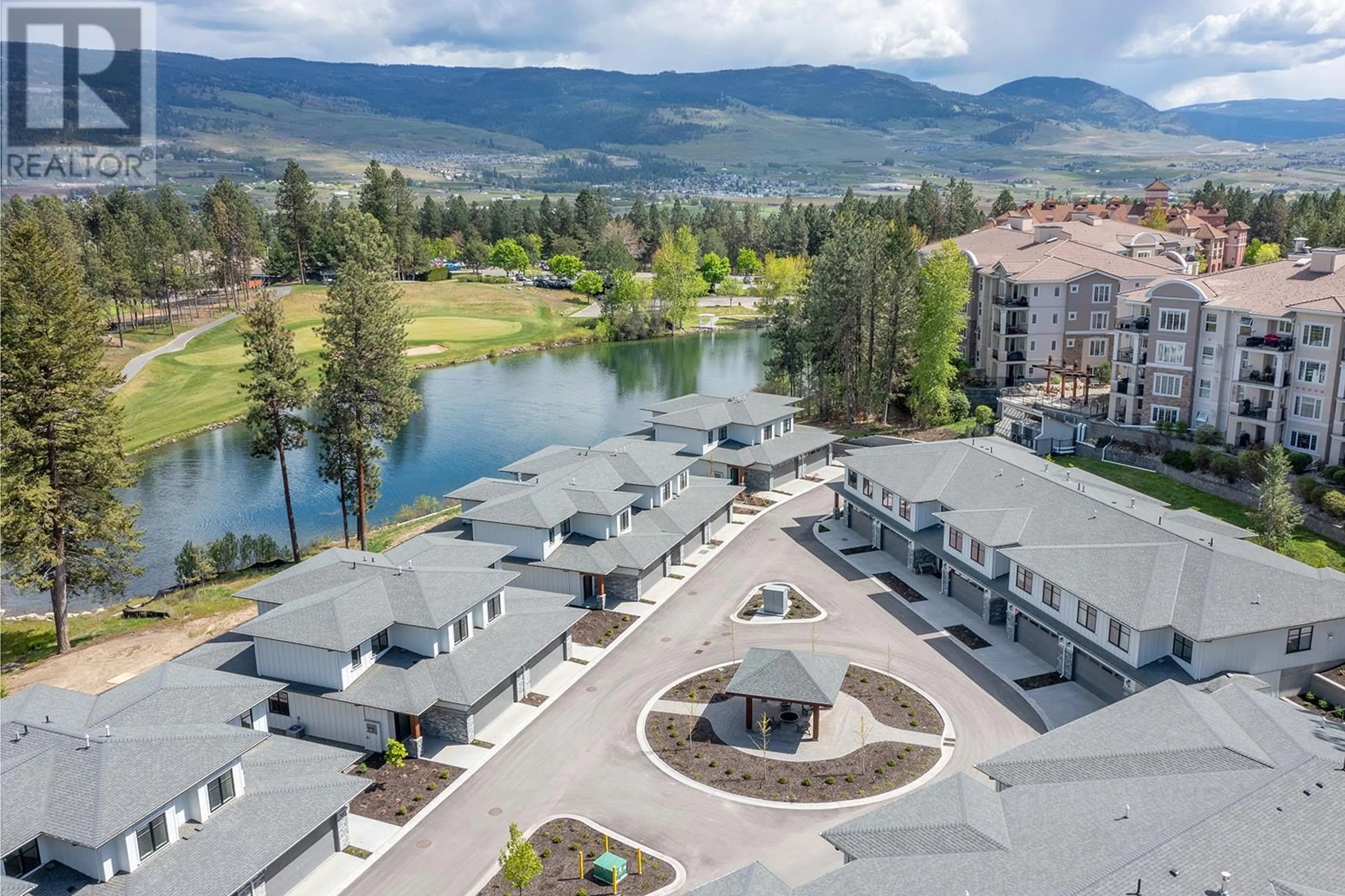 A pic from outside/outdoor area/front of a property/back of a property/a pic from drone, water/lake/river/ocean view for 1979 Country Club Drive Unit# 6, Kelowna British Columbia V1X0H6