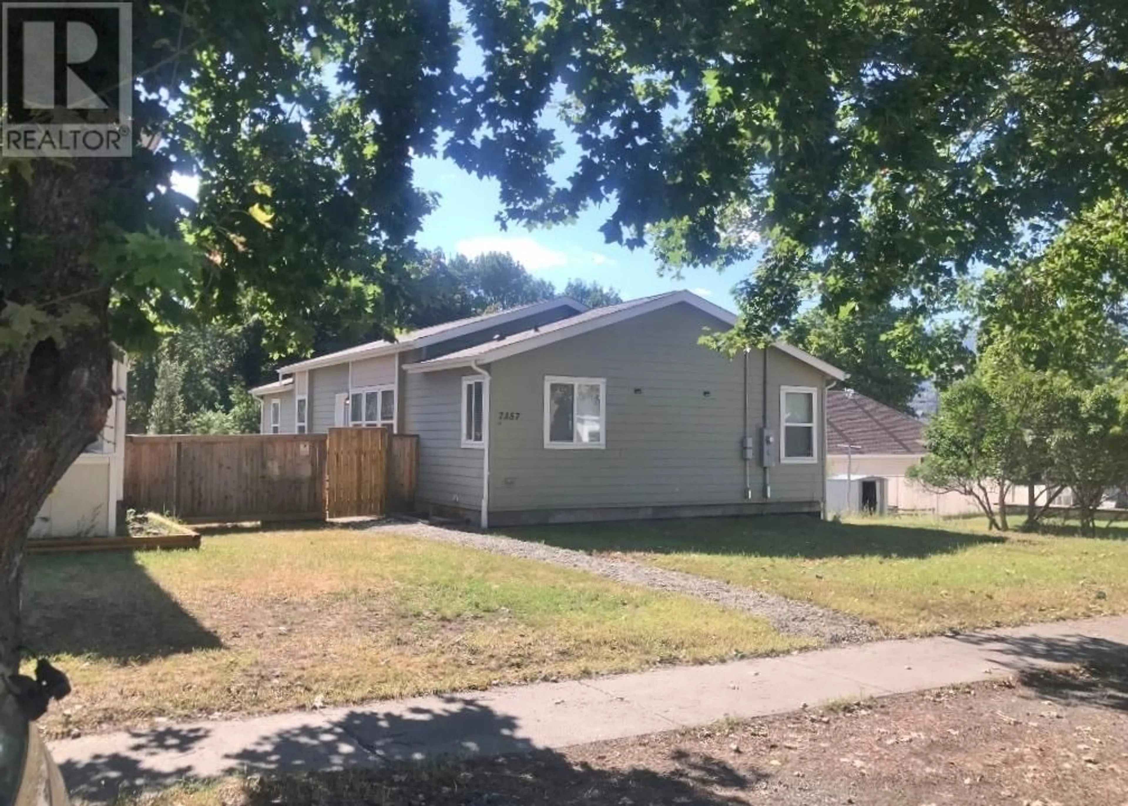 Home with vinyl exterior material, street for 7357 10TH Street, Grand Forks British Columbia V0H1H0