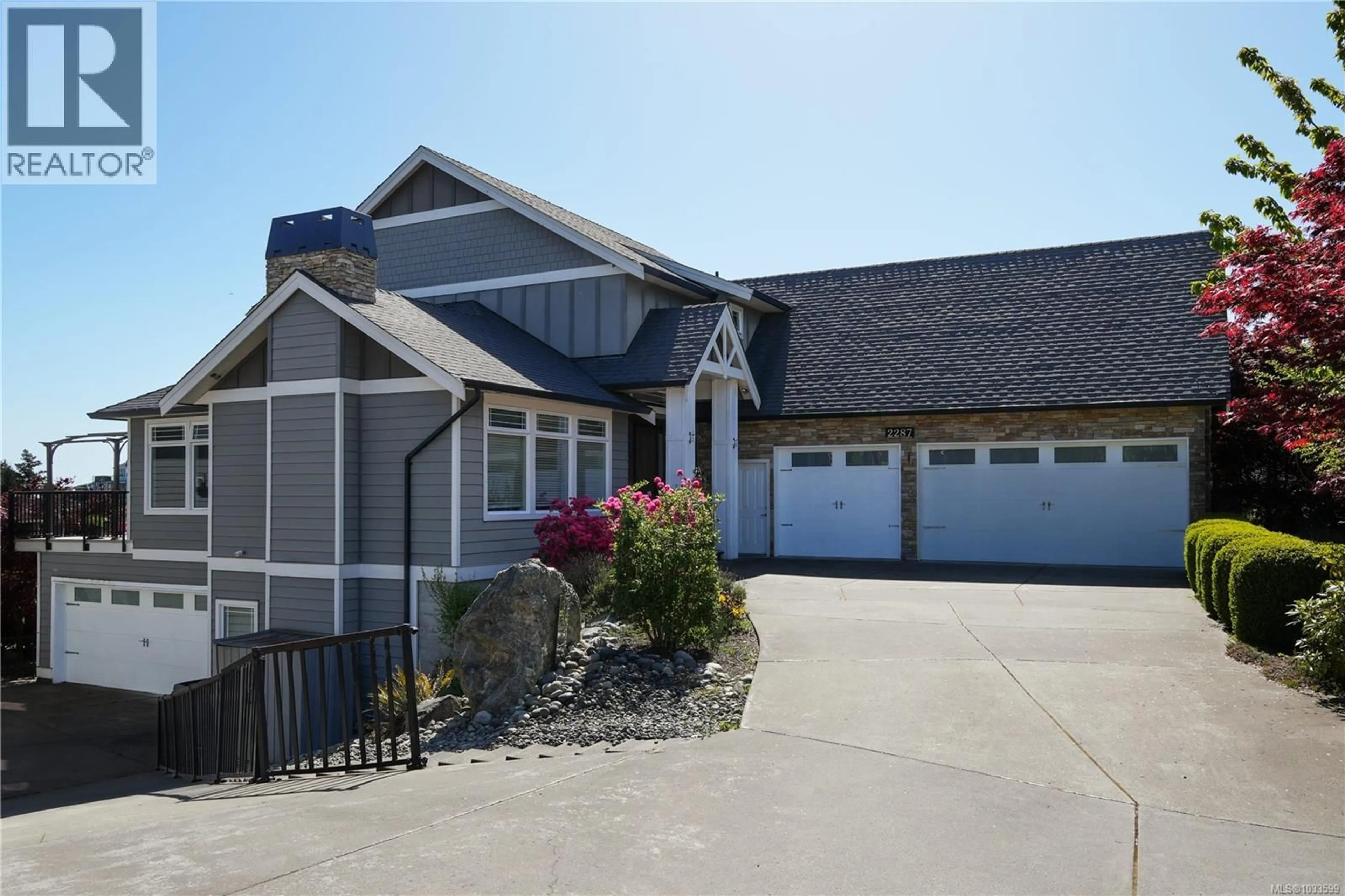 Home with vinyl exterior material, street for 2287 NICKLAUS DRIVE, Langford British Columbia V9B0L2