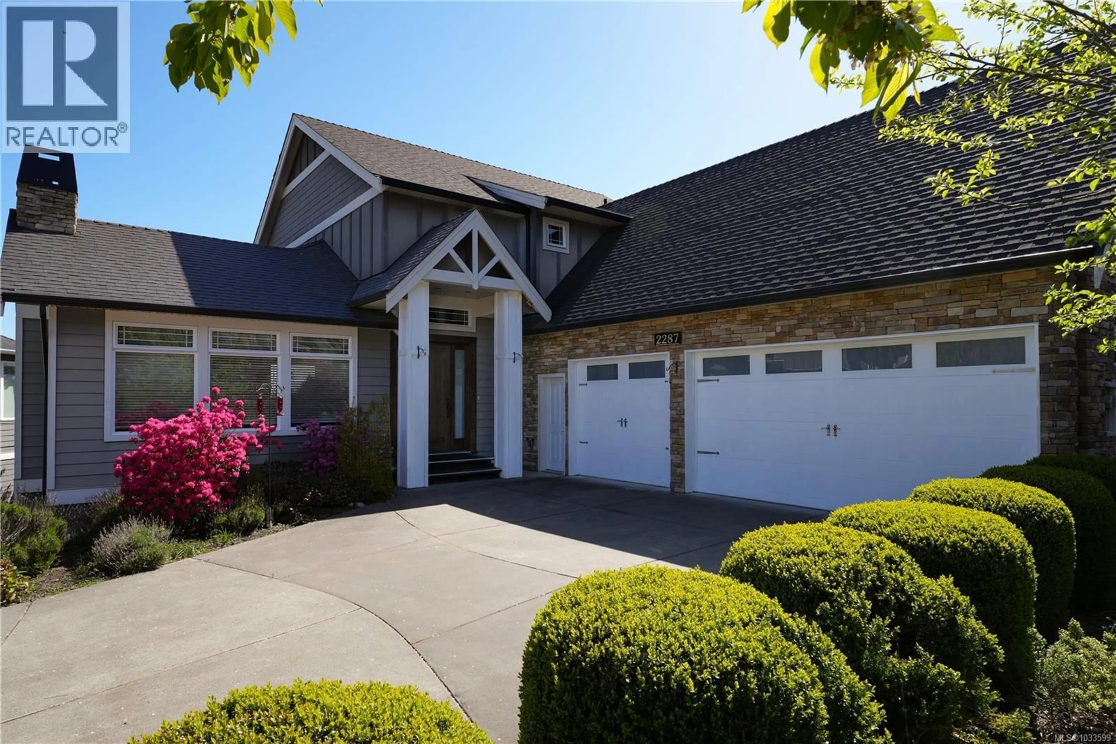 Home with vinyl exterior material, street for 2287 NICKLAUS DRIVE, Langford British Columbia V9B0L2