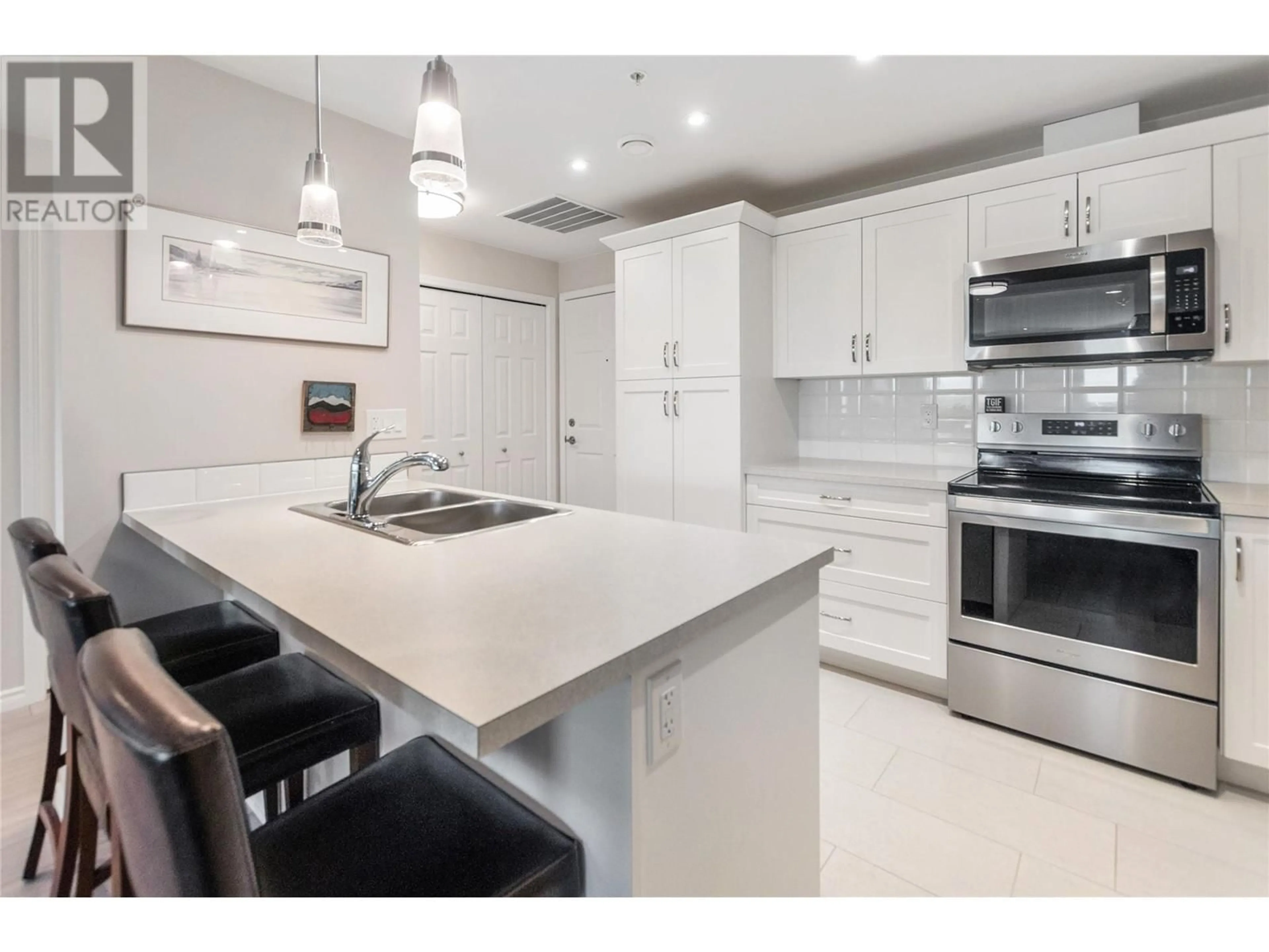 Open concept kitchen, ceramic/tile floor for 3346 Skaha Lake Road Unit# 802, Penticton British Columbia V2A0H6