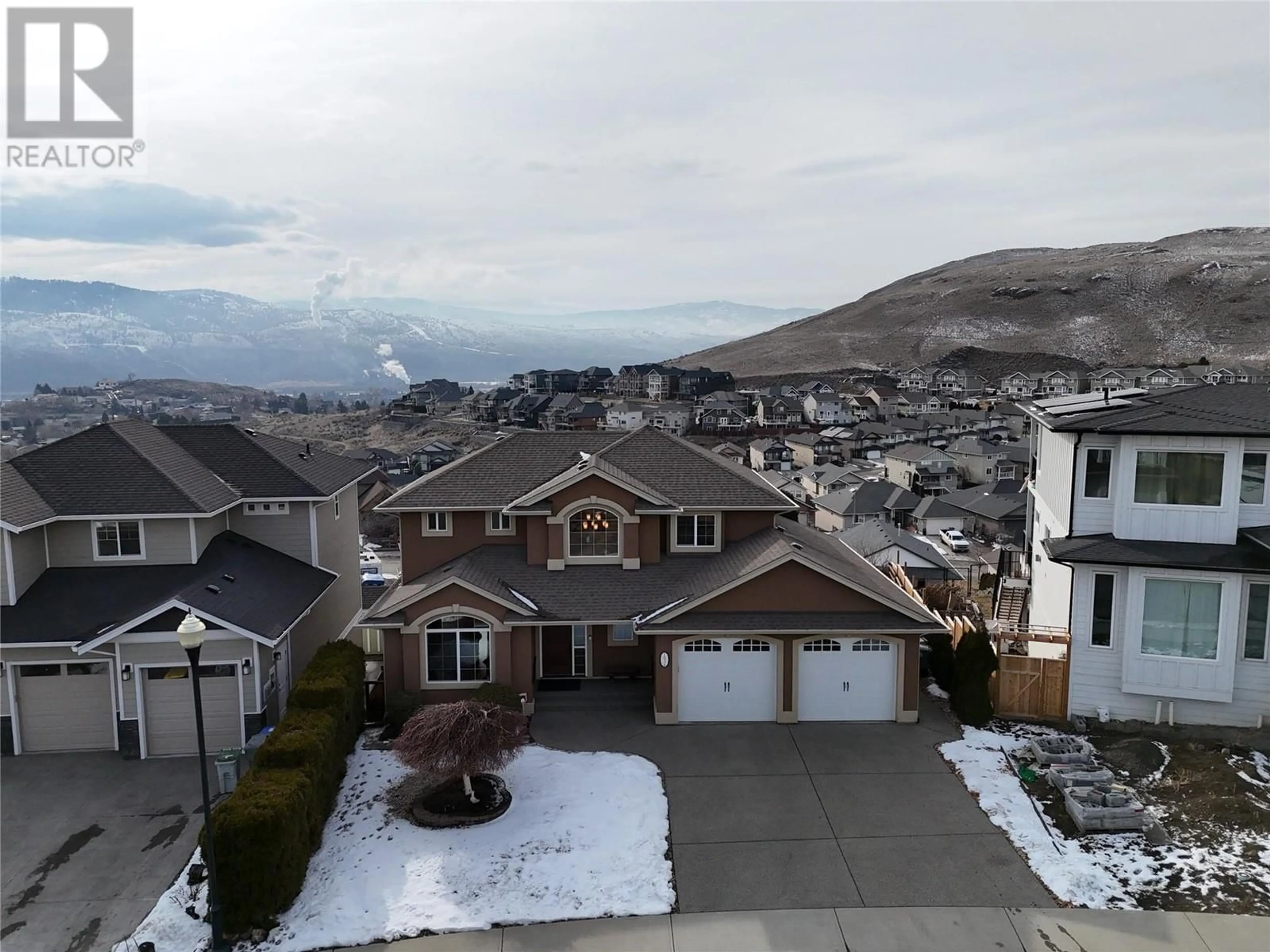 A pic from outside/outdoor area/front of a property/back of a property/a pic from drone, mountain view for 1036 Quails Roost Court, Kamloops British Columbia V2B0C5