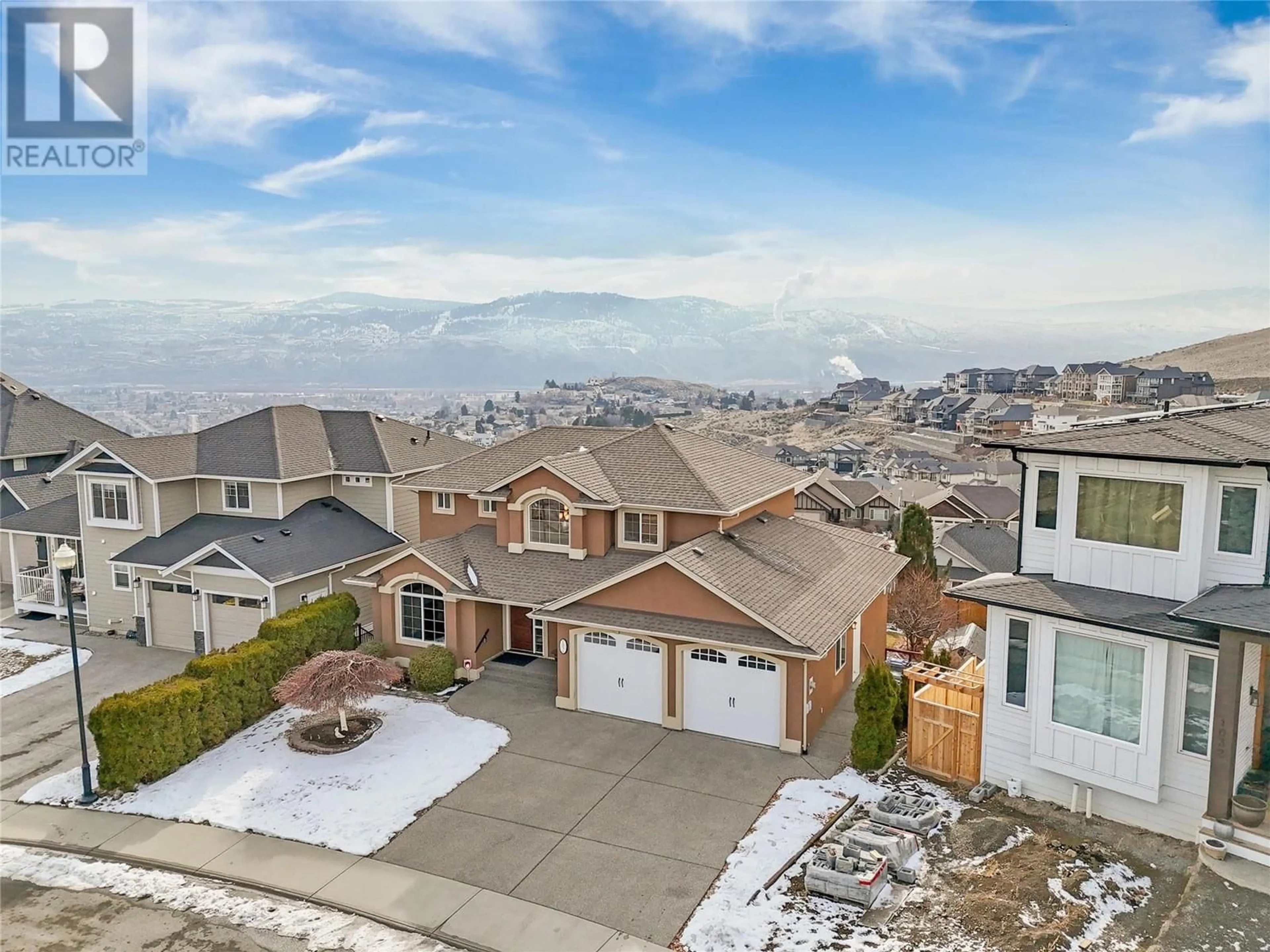 A pic from outside/outdoor area/front of a property/back of a property/a pic from drone, mountain view for 1036 Quails Roost Court, Kamloops British Columbia V2B0C5