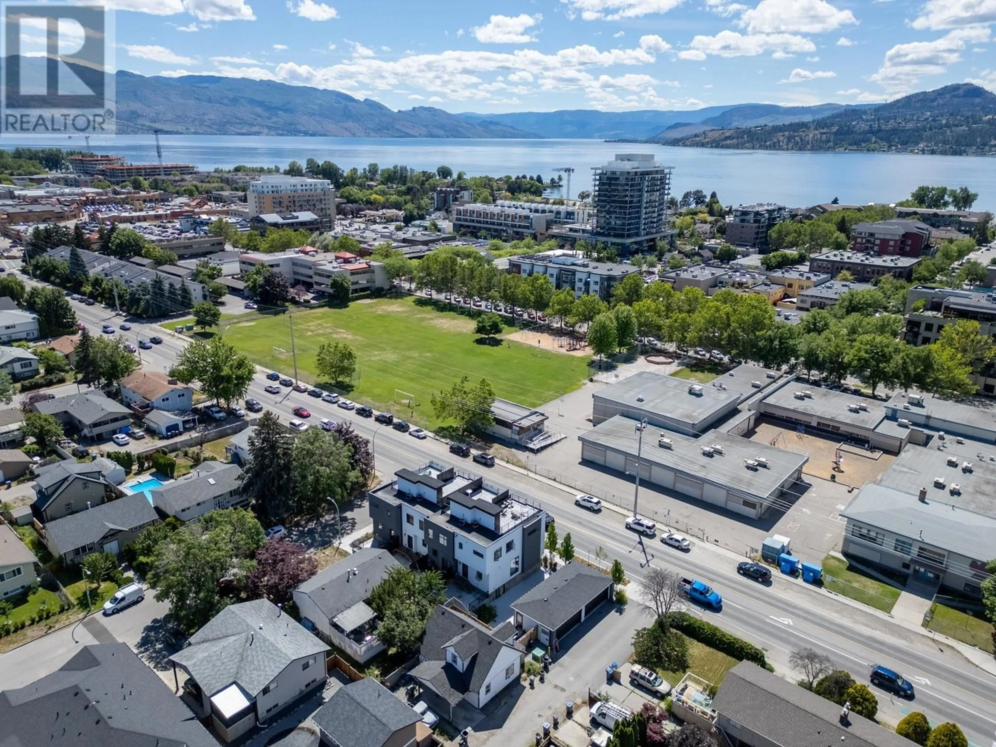 A pic from outside/outdoor area/front of a property/back of a property/a pic from drone, water/lake/river/ocean view for 2825 Richter Street Unit# 3, Kelowna British Columbia V1Y2R6