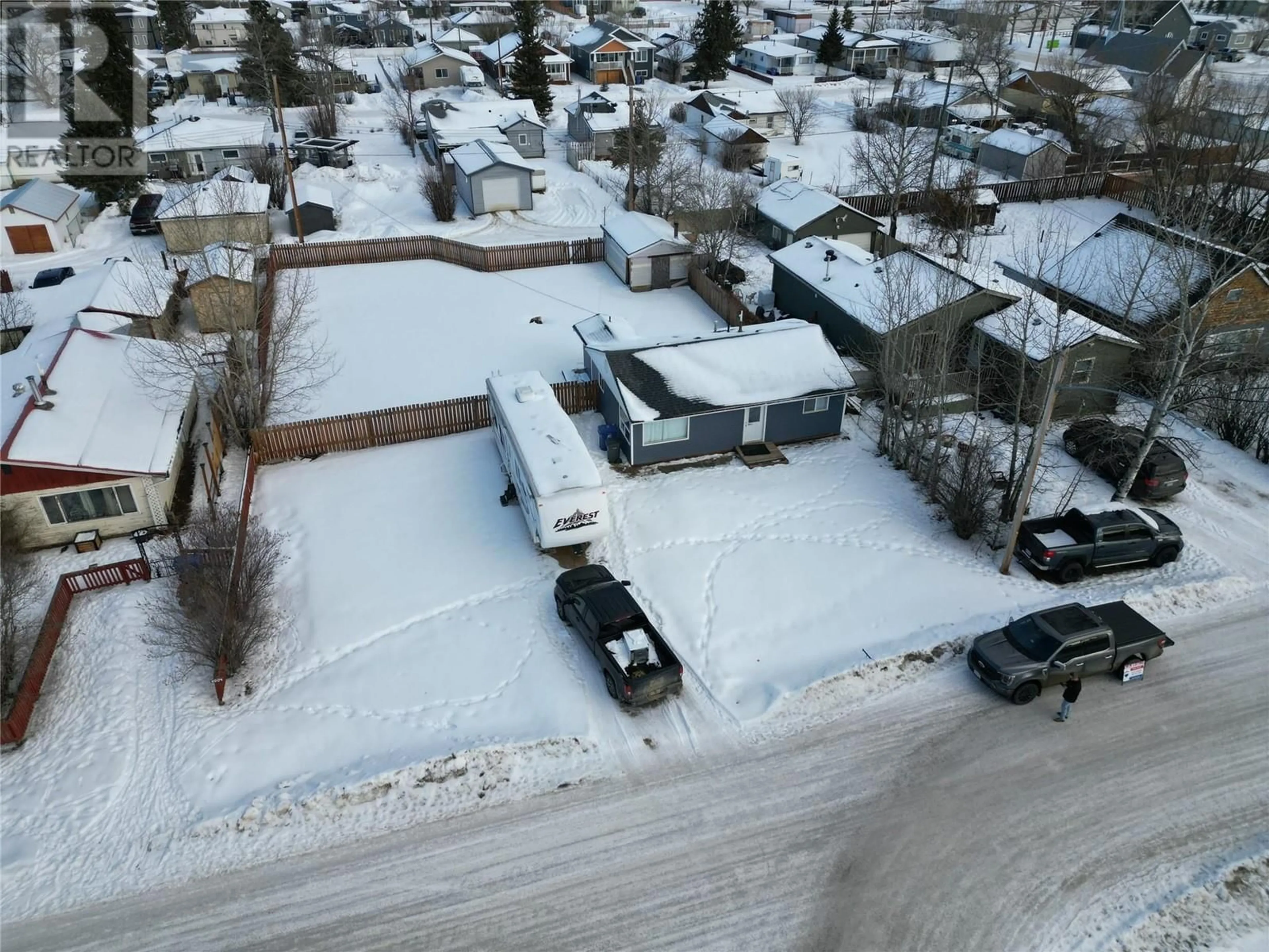 A pic from outside/outdoor area/front of a property/back of a property/a pic from drone, street for 4908 47 Avenue, Pouce Coupe British Columbia V0C2C0