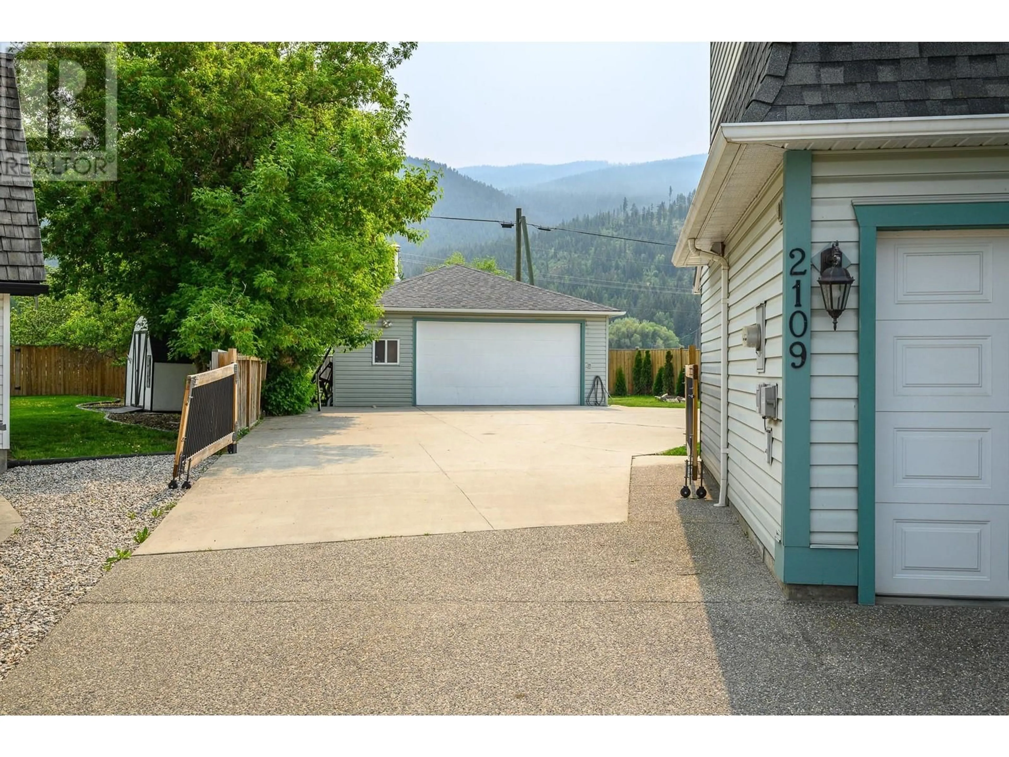 A pic from outside/outdoor area/front of a property/back of a property/a pic from drone, mountain view for 2109 HUNTER AVENUE, Armstrong British Columbia V0E1B0
