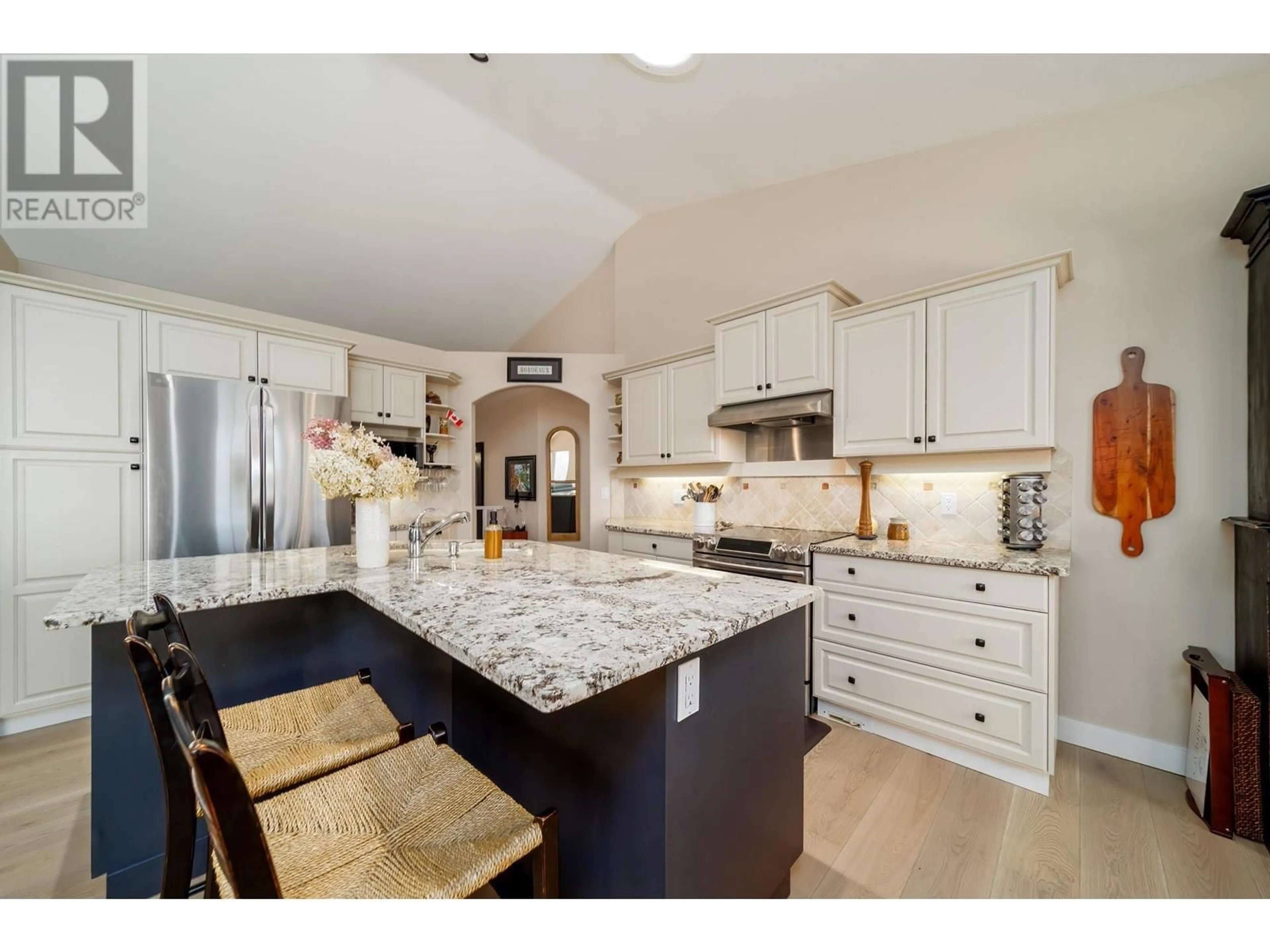 Open concept kitchen, ceramic/tile floor for 316 Woodcrest Court, Kelowna British Columbia V1V2L3