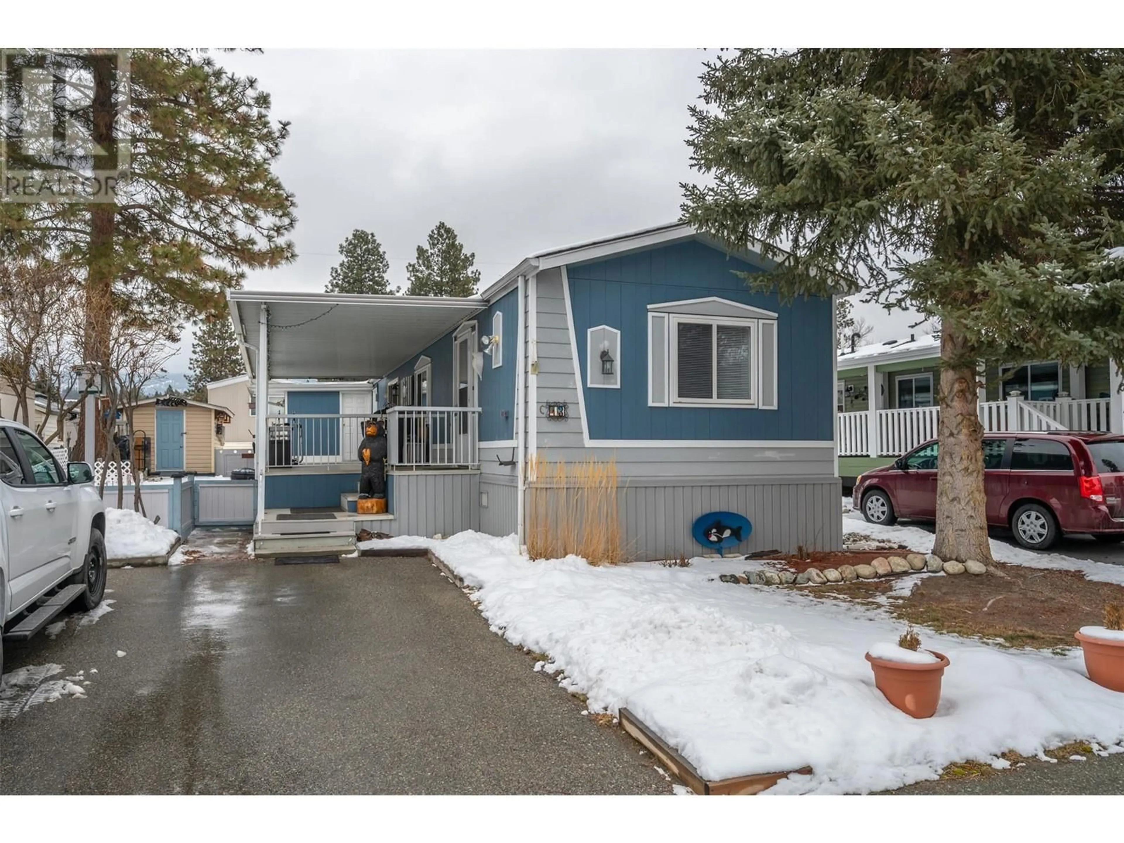 Home with vinyl exterior material, street for 4505 McLean Creek Road Unit# C13, Okanagan Falls British Columbia V0H1R1