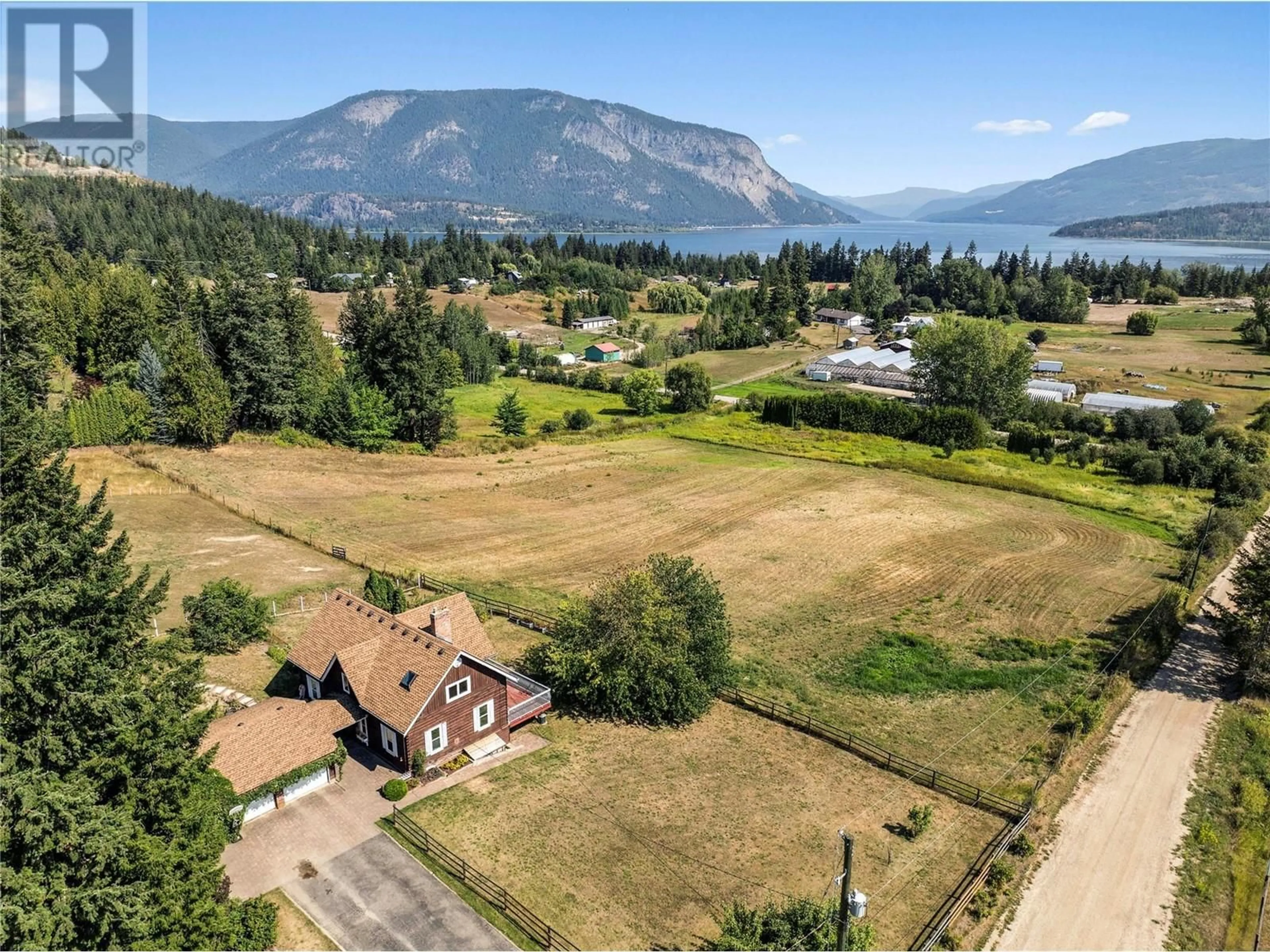 A pic from outside/outdoor area/front of a property/back of a property/a pic from drone, mountain view for 5931 40 Street NW, Salmon Arm British Columbia V1E3B6