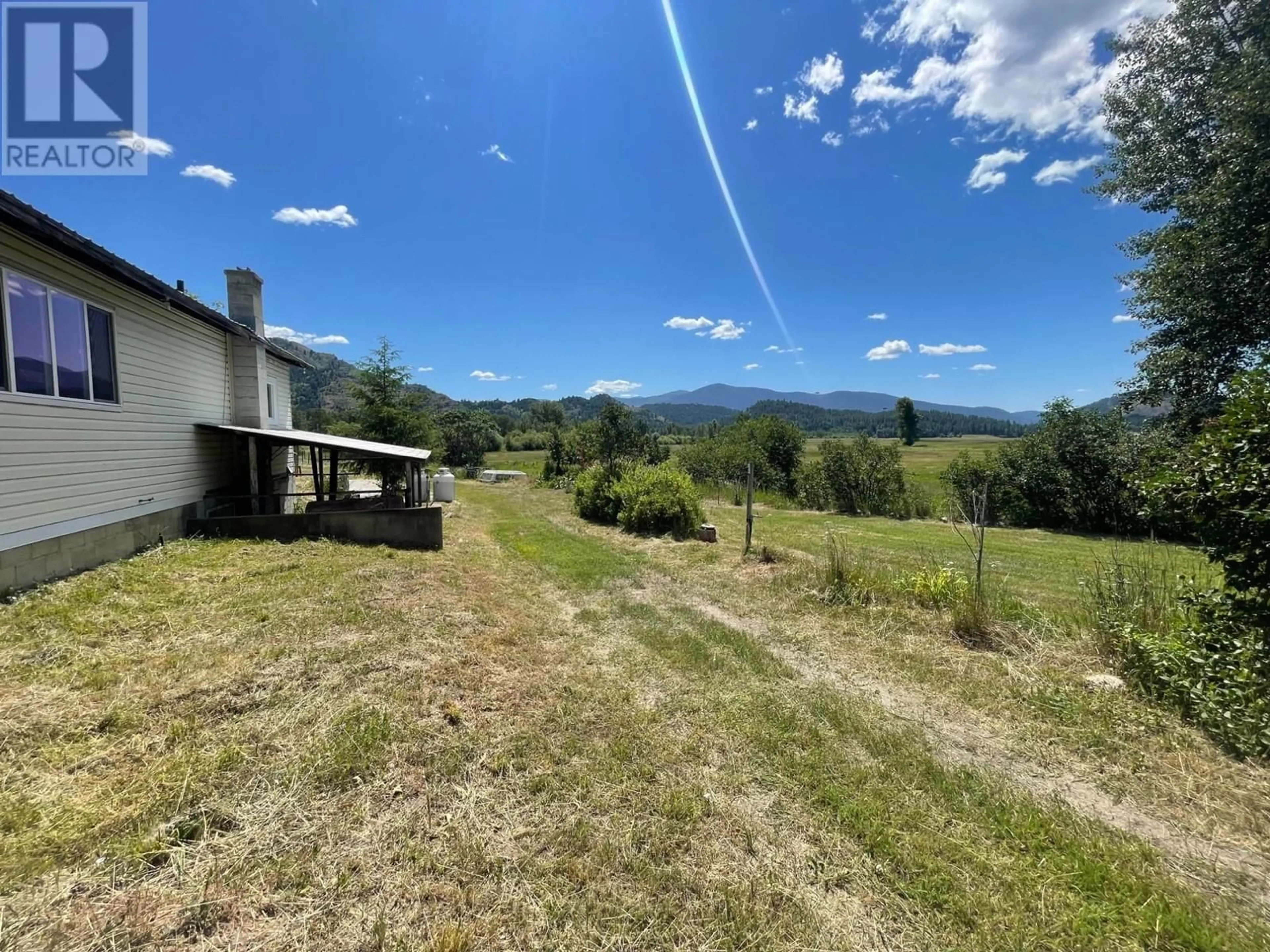 A pic from outside/outdoor area/front of a property/back of a property/a pic from drone, mountain view for 9270 NORTH FORK Road, Grand Forks British Columbia V0H1H2