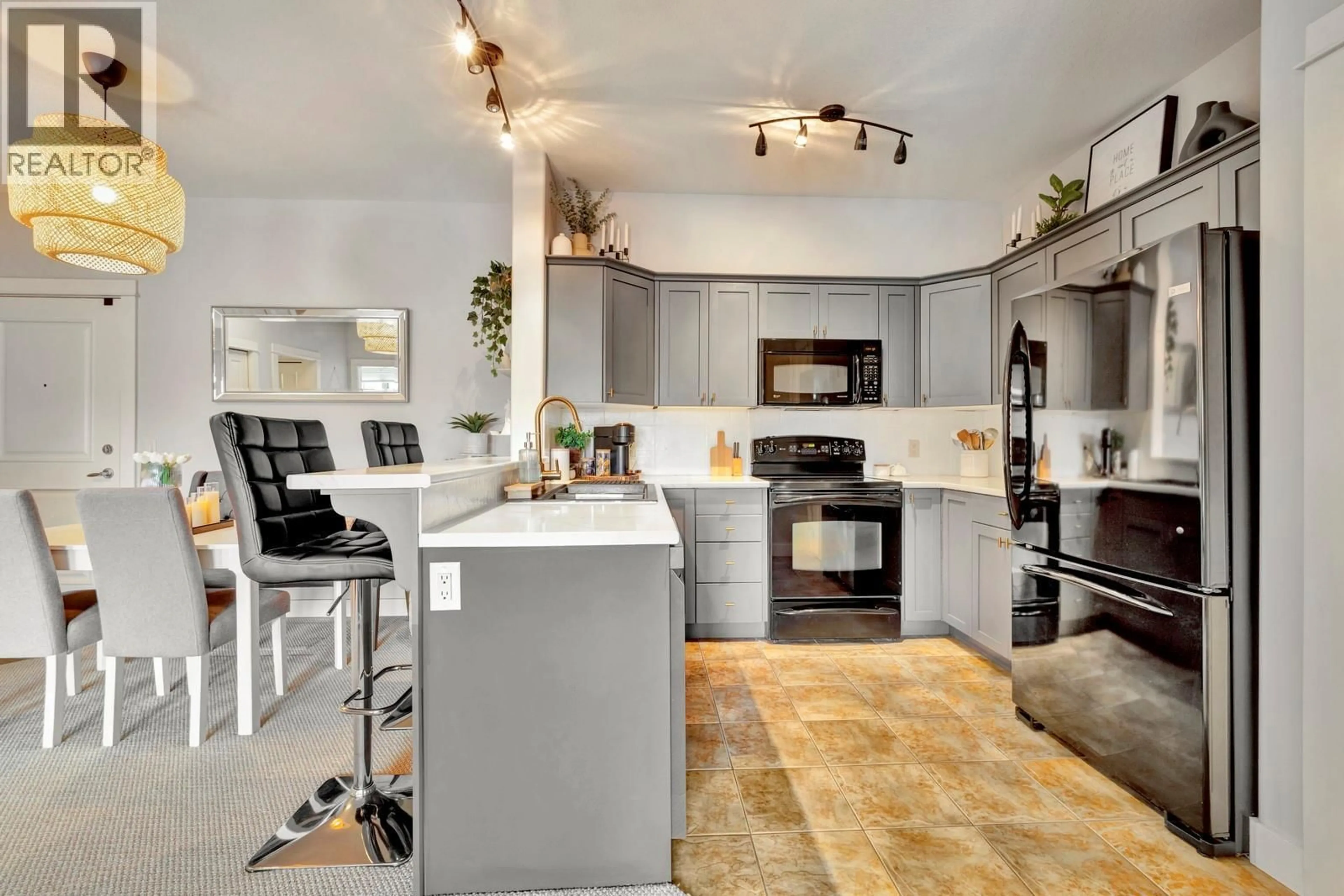Open concept kitchen, ceramic/tile floor for 214 - 2551 SHORELINE DRIVE, Lake Country British Columbia V4V2P2