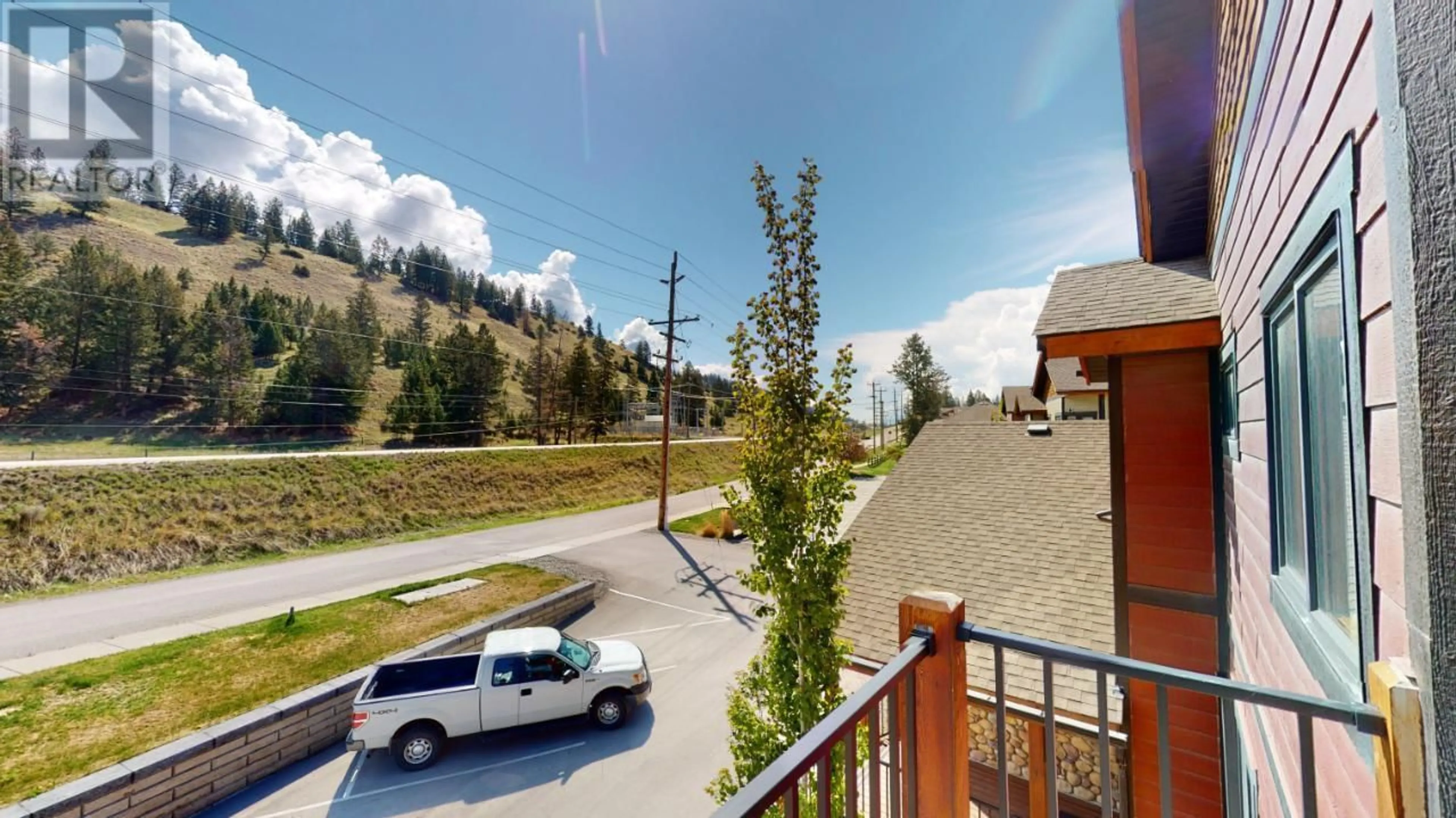 A pic from outside/outdoor area/front of a property/back of a property/a pic from drone, mountain view for 105 - 7291 PROSPECTOR AVENUE, Radium Hot Springs British Columbia V0A1M0