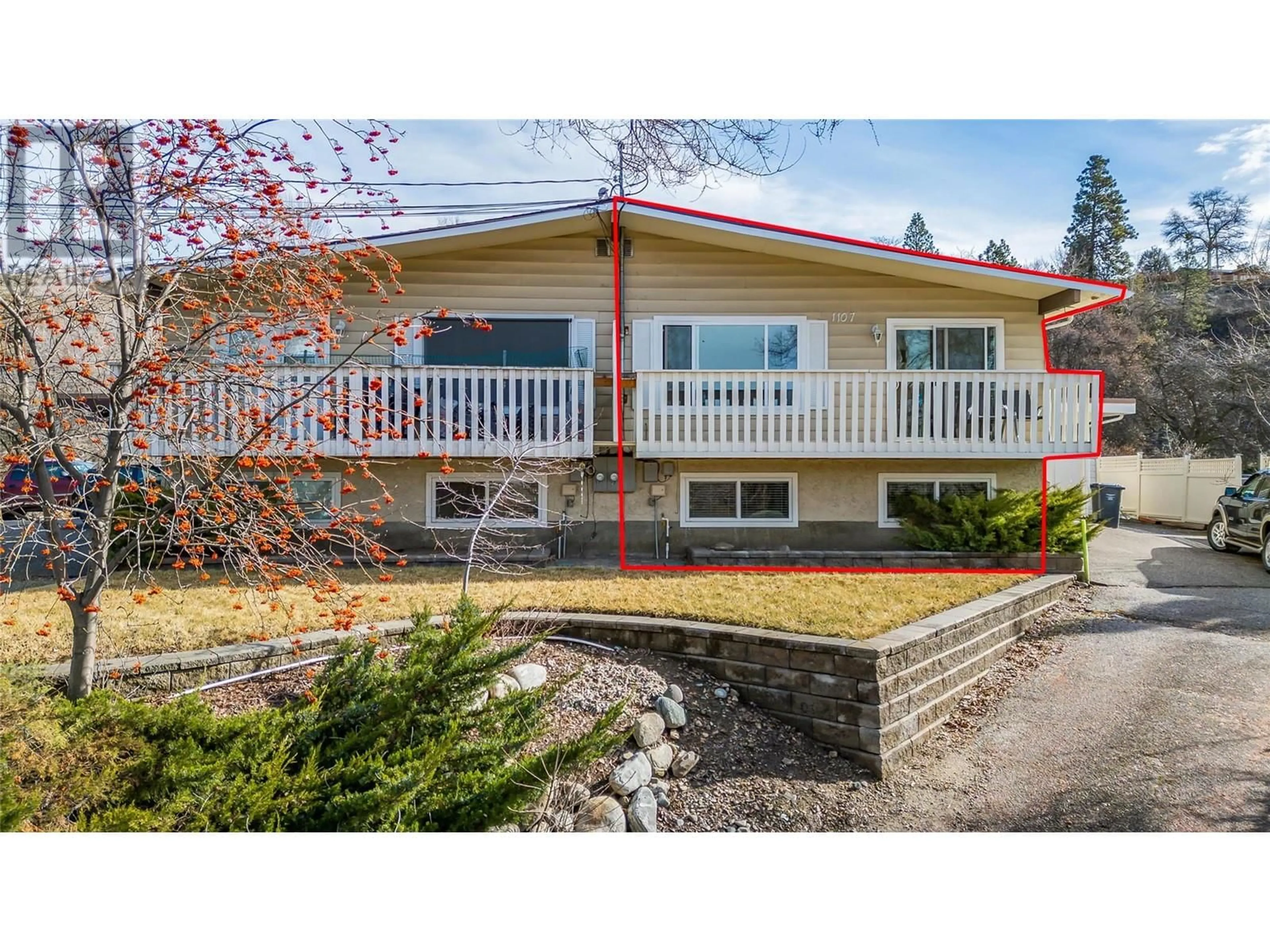 Home with vinyl exterior material, street for 1107 Cactus Road, Kelowna British Columbia V1X3N3