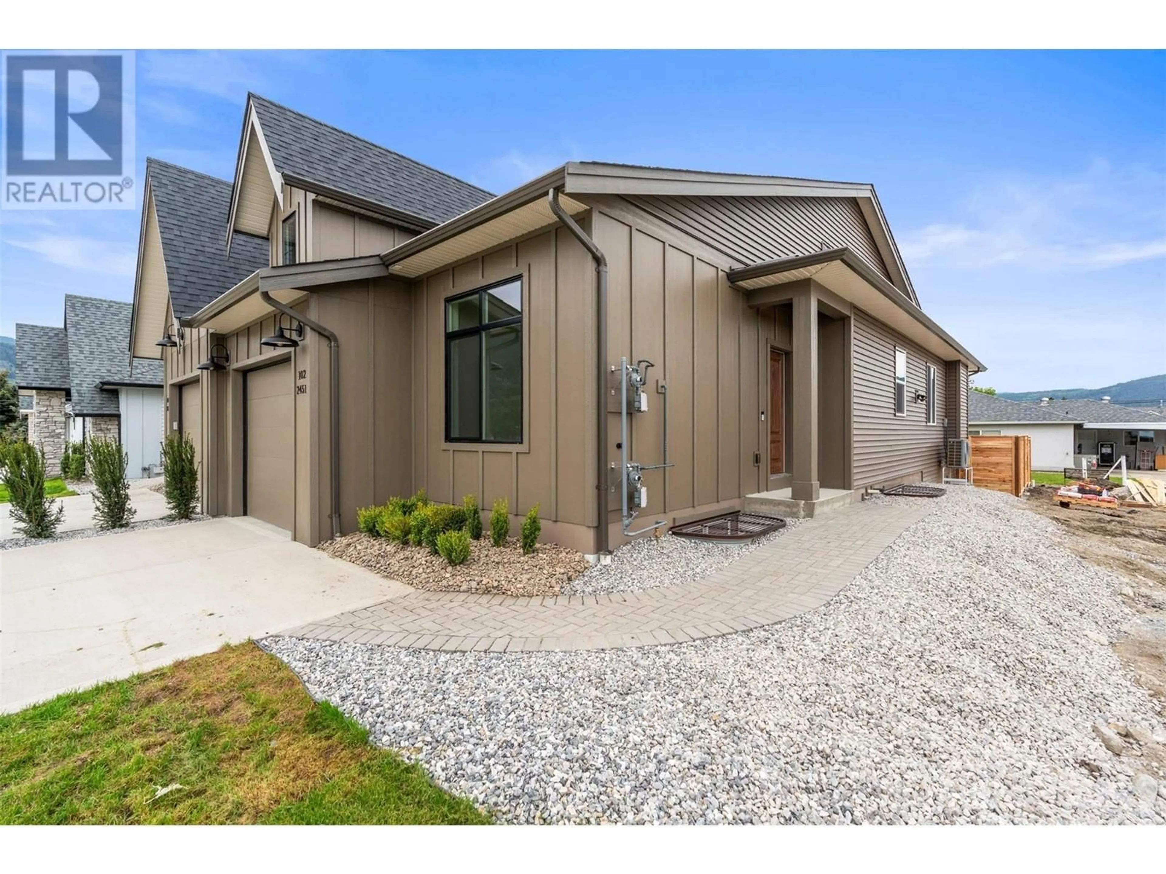 Home with brick exterior material, street for 102 - 2451 BRADLEY DRIVE, Armstrong British Columbia V4Y0Y4