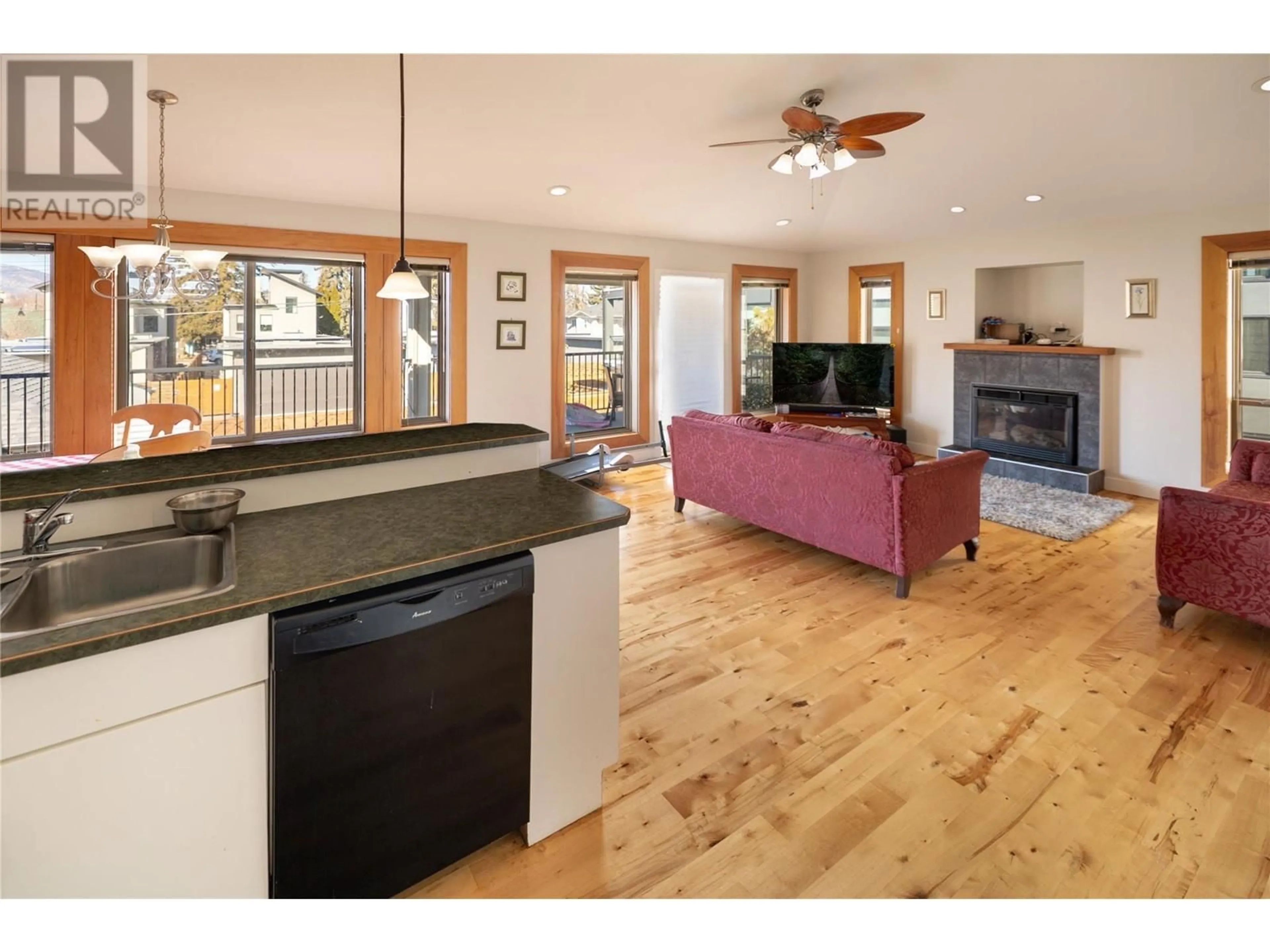 Open concept kitchen, wood/laminate floor for 622 WARDLAW AVENUE, Kelowna British Columbia V1Y5B7