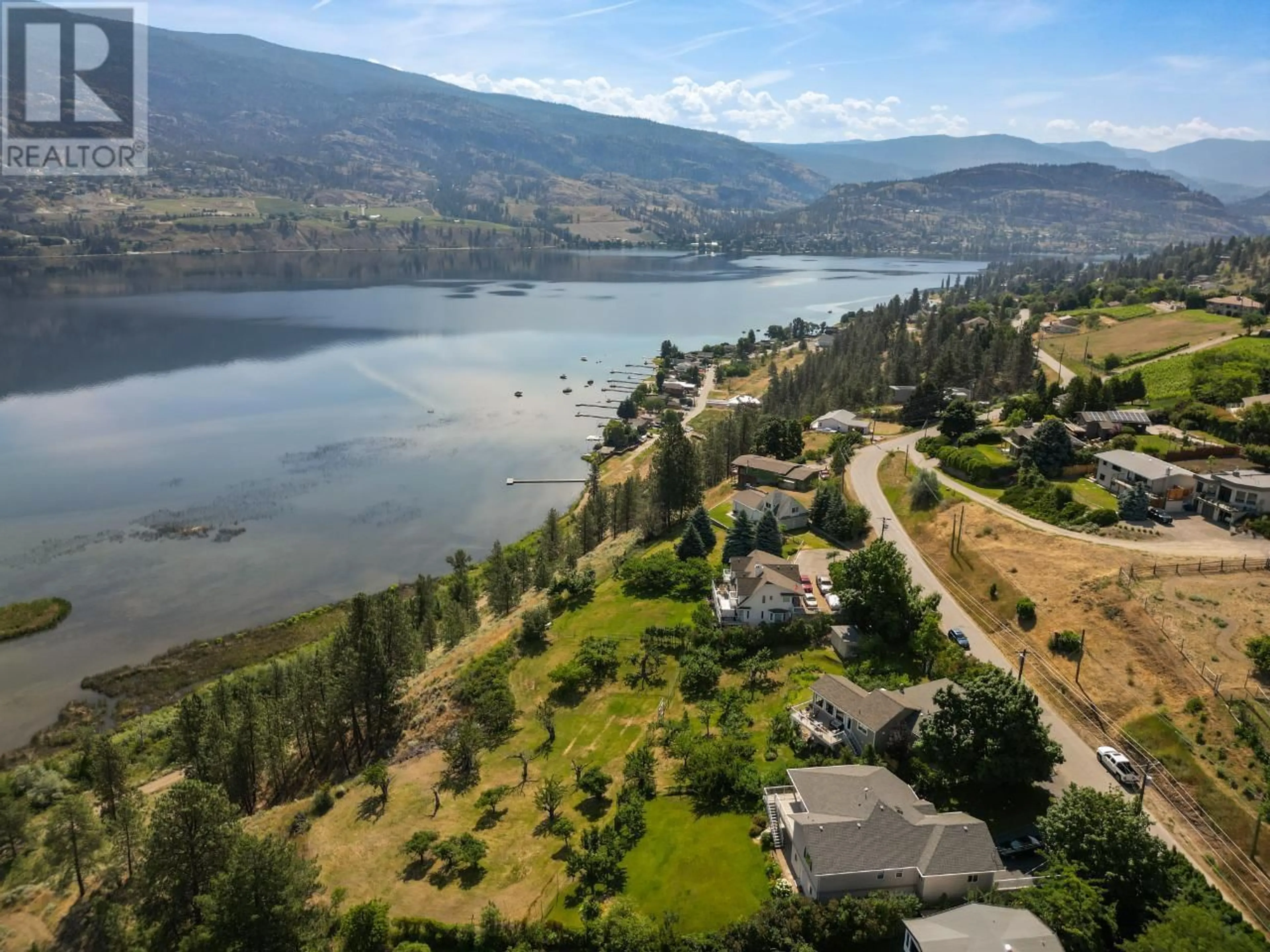 A pic from outside/outdoor area/front of a property/back of a property/a pic from drone, water/lake/river/ocean view for 300 PINEVIEW DRIVE, Kaleden British Columbia V0H1K0