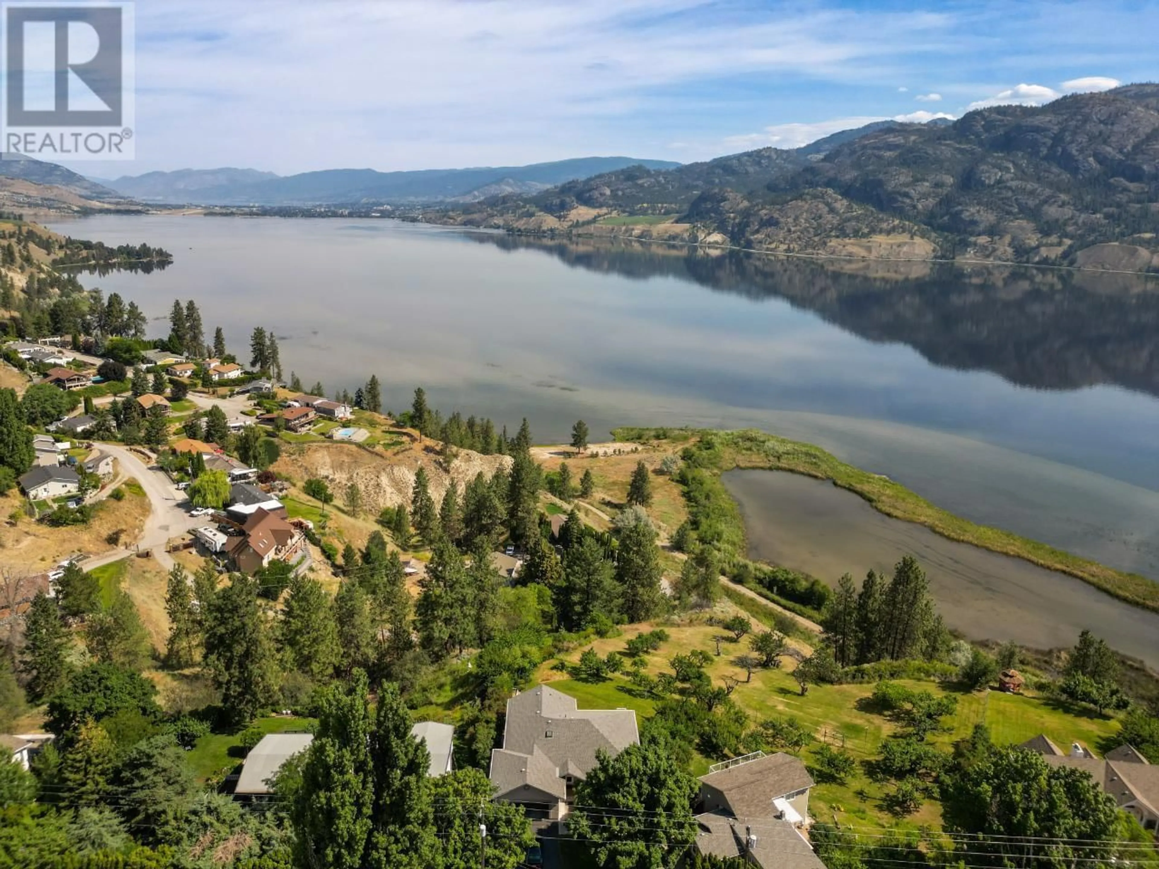 A pic from outside/outdoor area/front of a property/back of a property/a pic from drone, water/lake/river/ocean view for 300 PINEVIEW DRIVE, Kaleden British Columbia V0H1K0