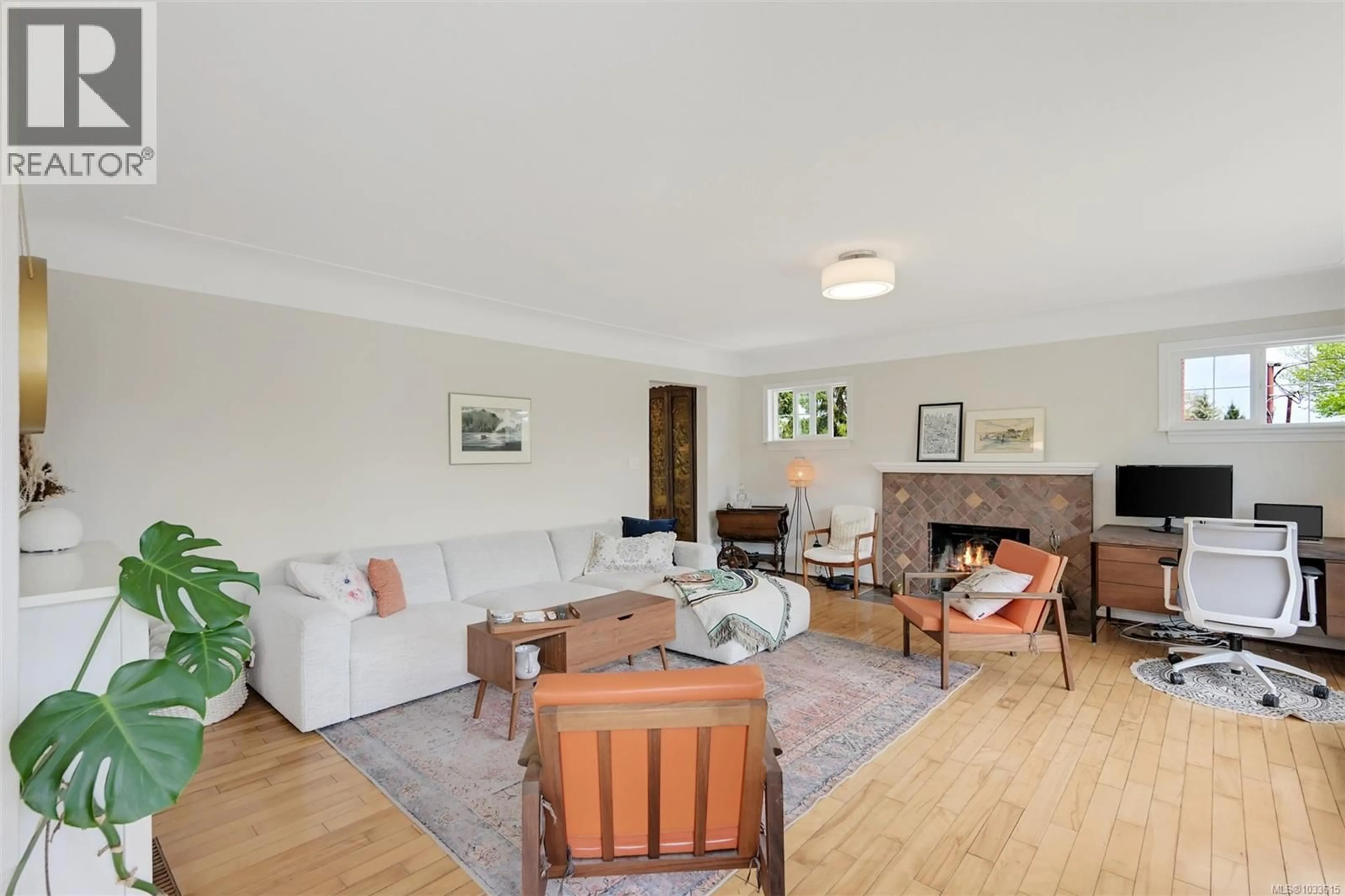 Living room with furniture, wood/laminate floor for 1452 WESTALL AVENUE, Victoria British Columbia V8T2G5