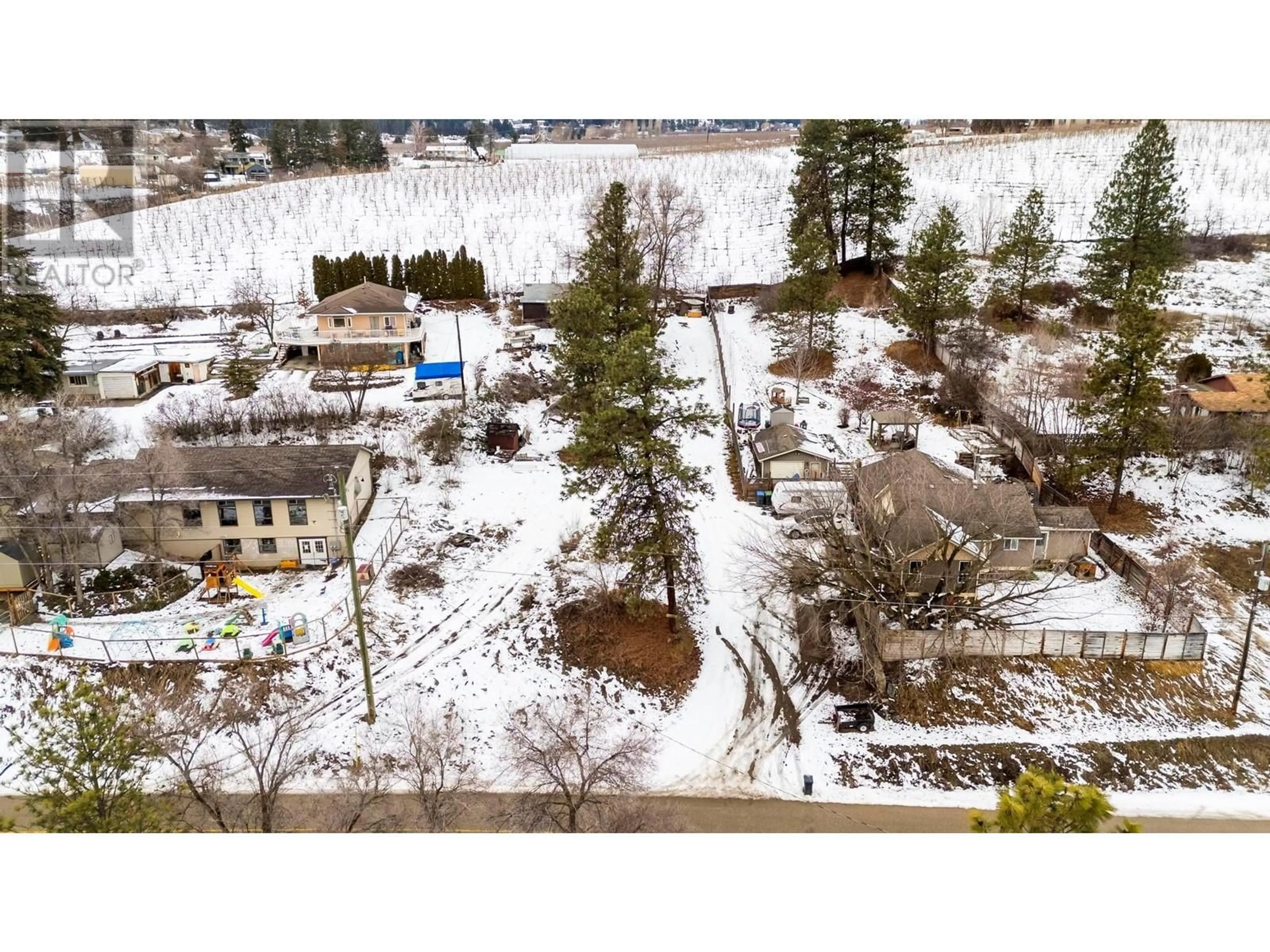 A pic from outside/outdoor area/front of a property/back of a property/a pic from drone, mountain view for 10214 Newene Road, Lake Country British Columbia V4V1V2