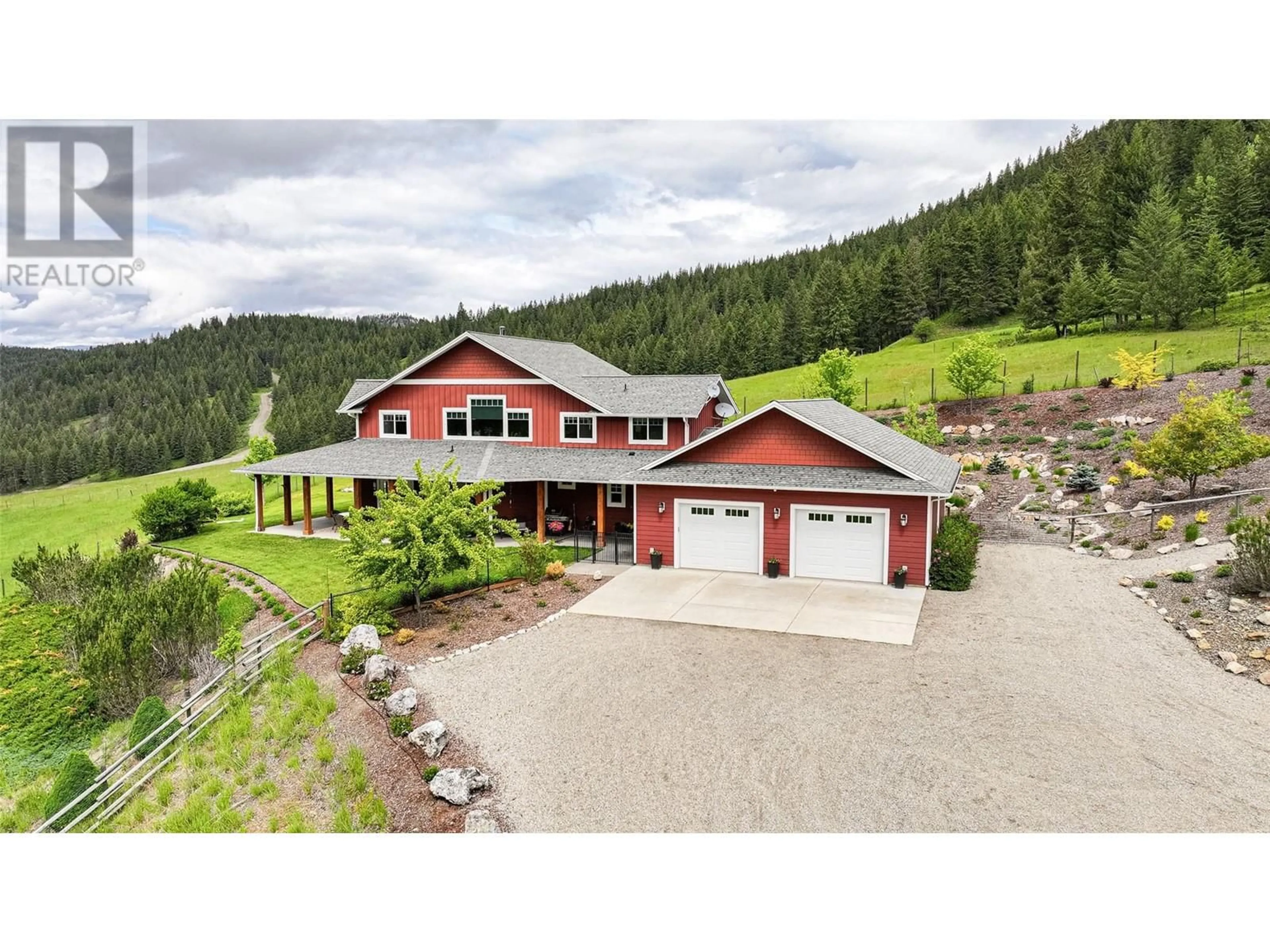 A pic from outside/outdoor area/front of a property/back of a property/a pic from drone, unknown for 705 CREIGHTON VALLEY ROAD, Lumby British Columbia V0E2G1