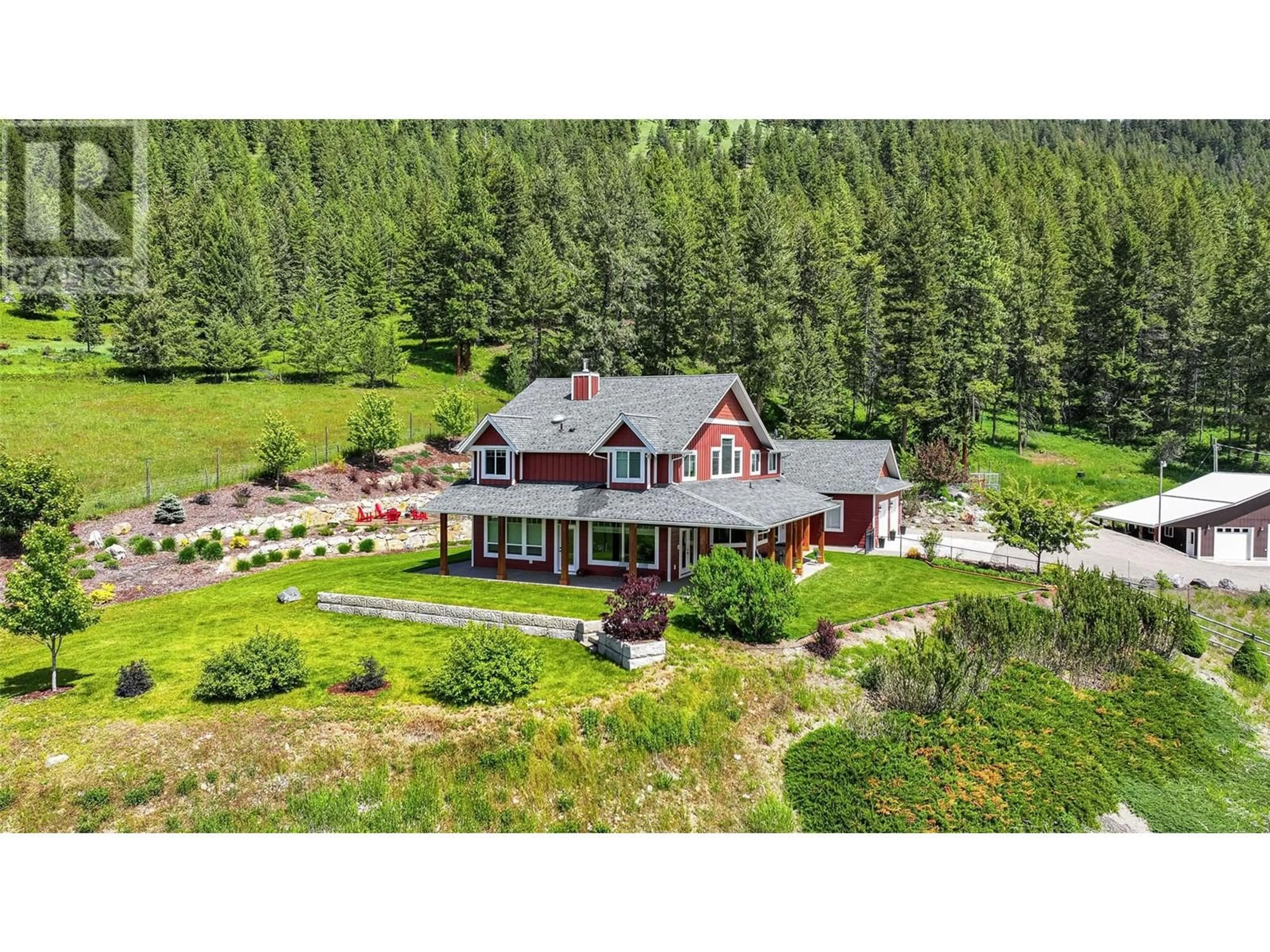 A pic from outside/outdoor area/front of a property/back of a property/a pic from drone, mountain view for 705 Creighton Valley Road, Lumby British Columbia V0E2G1