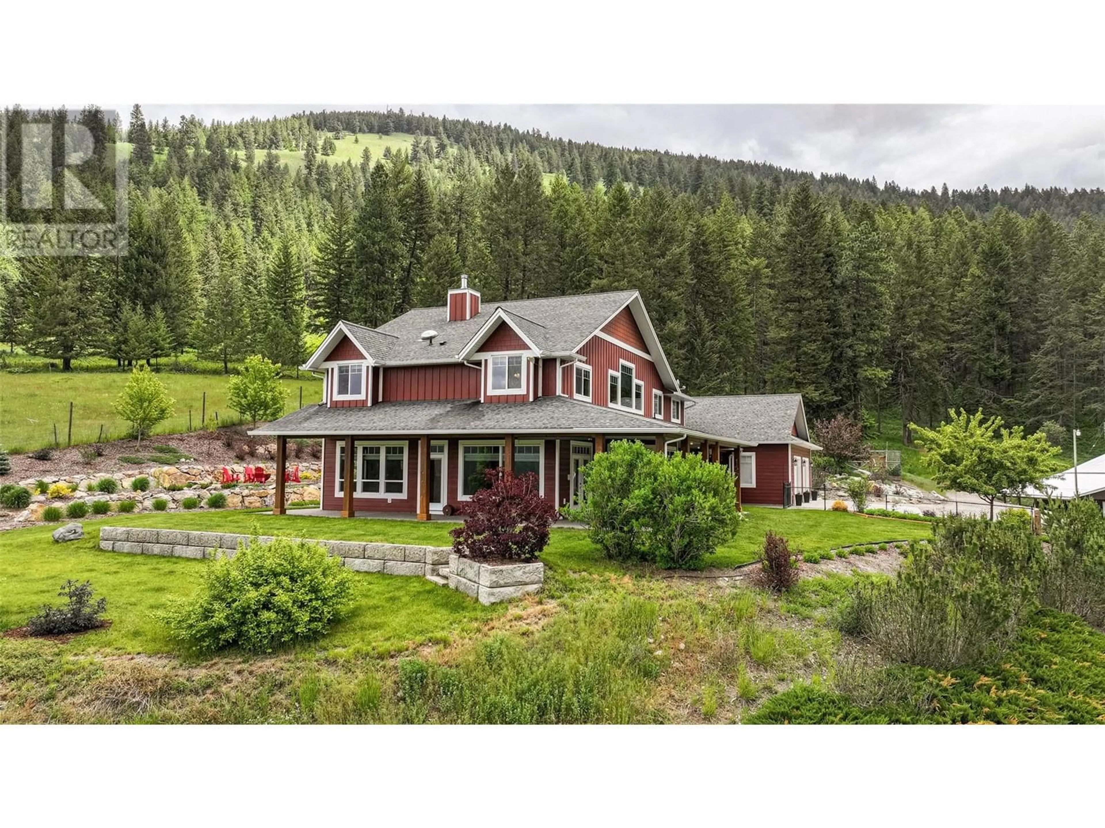 A pic from outside/outdoor area/front of a property/back of a property/a pic from drone, mountain view for 705 Creighton Valley Road, Lumby British Columbia V0E2G1