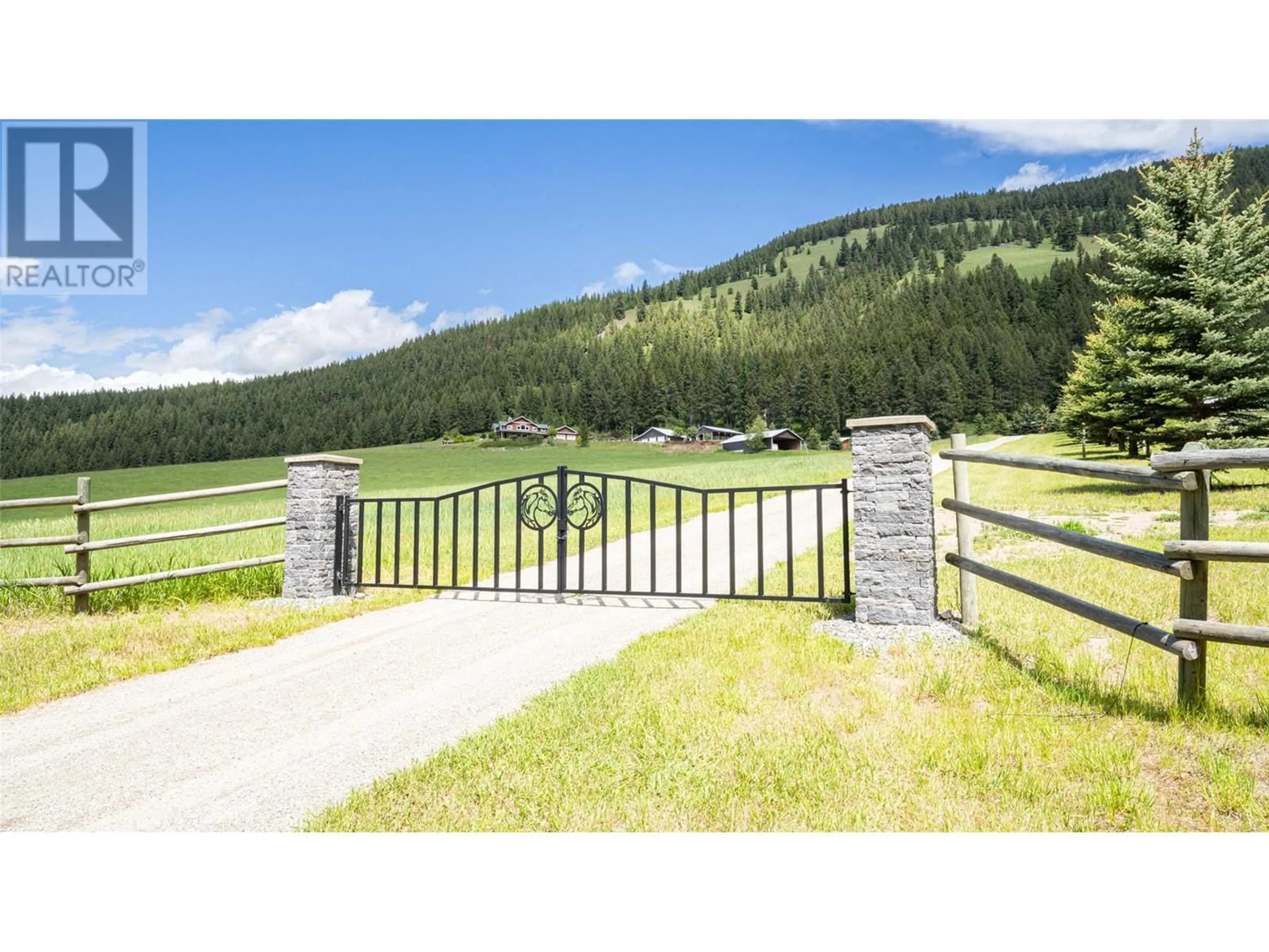 A pic from outside/outdoor area/front of a property/back of a property/a pic from drone, mountain view for 705 Creighton Valley Road, Lumby British Columbia V0E2G1