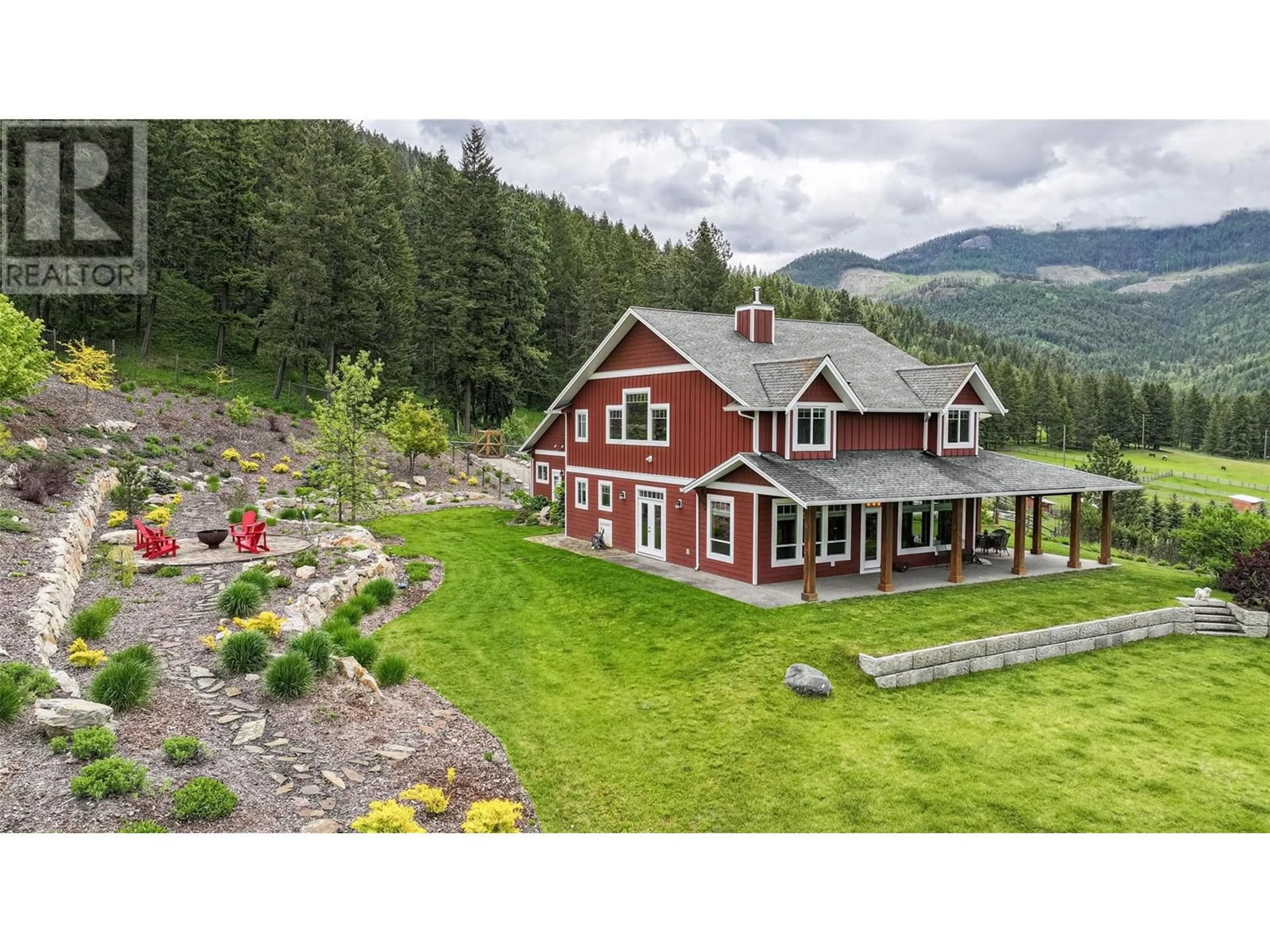 A pic from outside/outdoor area/front of a property/back of a property/a pic from drone, mountain view for 705 Creighton Valley Road, Lumby British Columbia V0E2G1