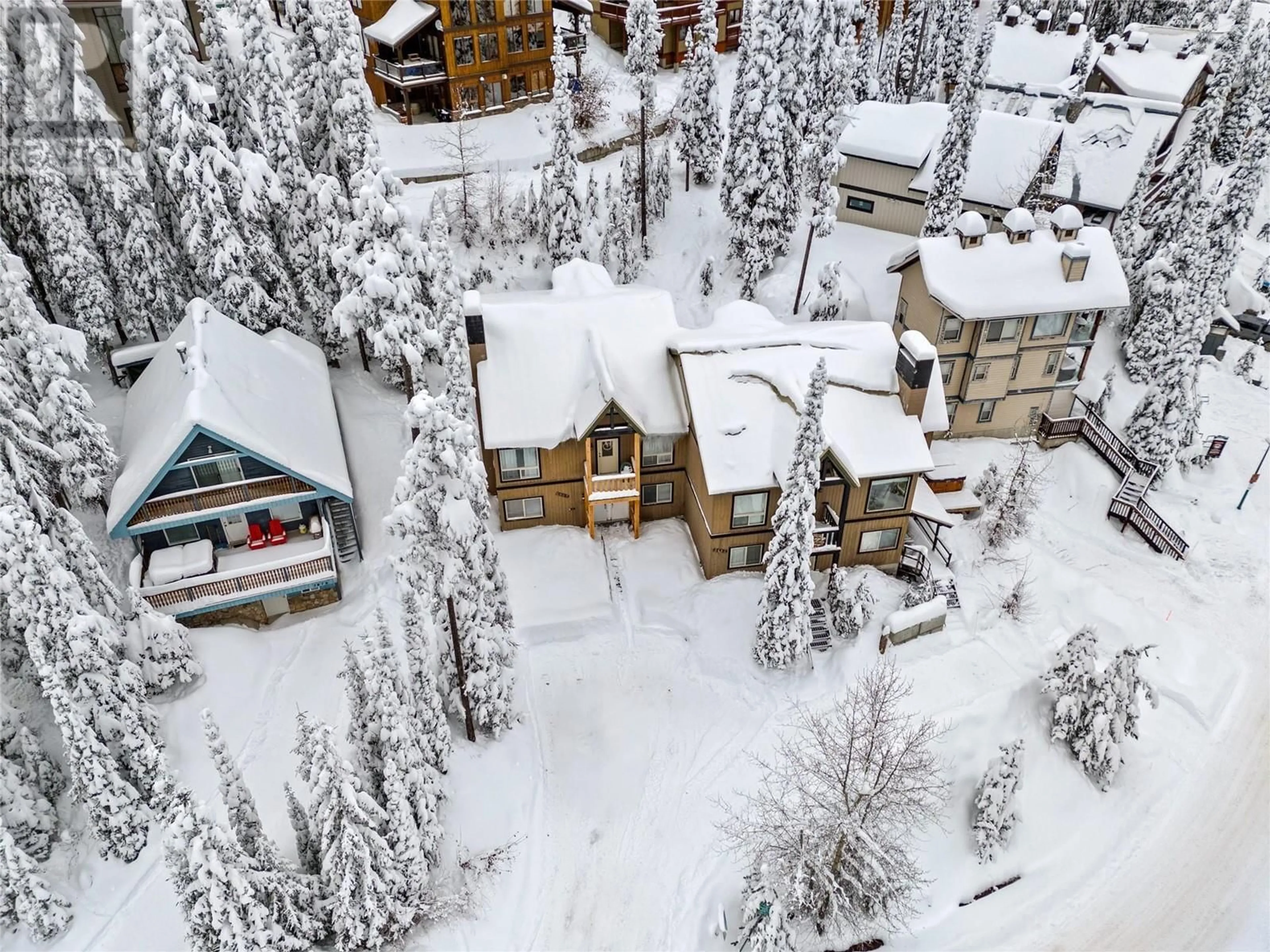 A pic from outside/outdoor area/front of a property/back of a property/a pic from drone, unknown for A - 5882 SNOW PINES CRESCENT, Kelowna British Columbia V1P1T4