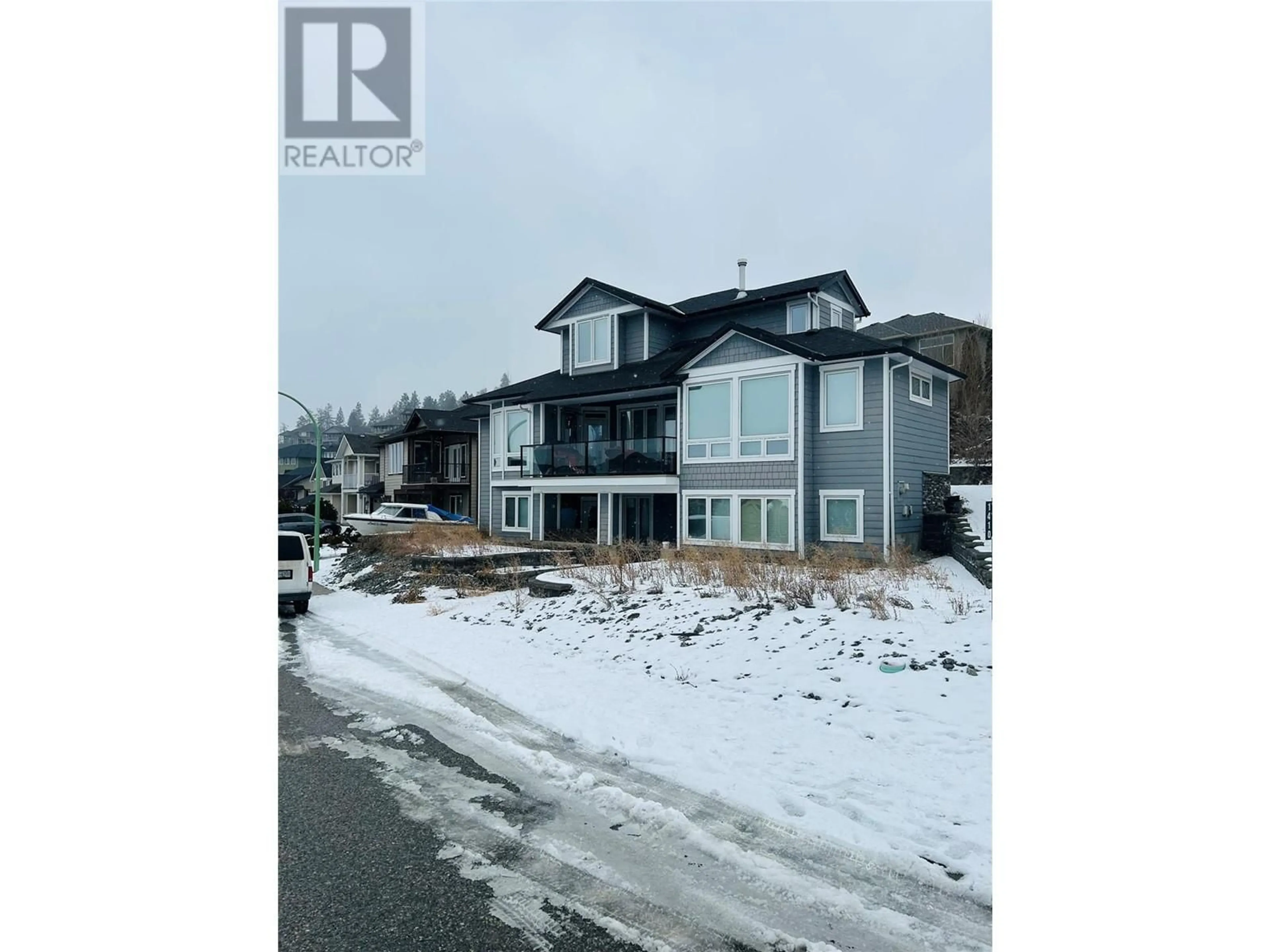 A pic from outside/outdoor area/front of a property/back of a property/a pic from drone, unknown for 1410 Tanemura Crescent, Kelowna British Columbia V1P1R5