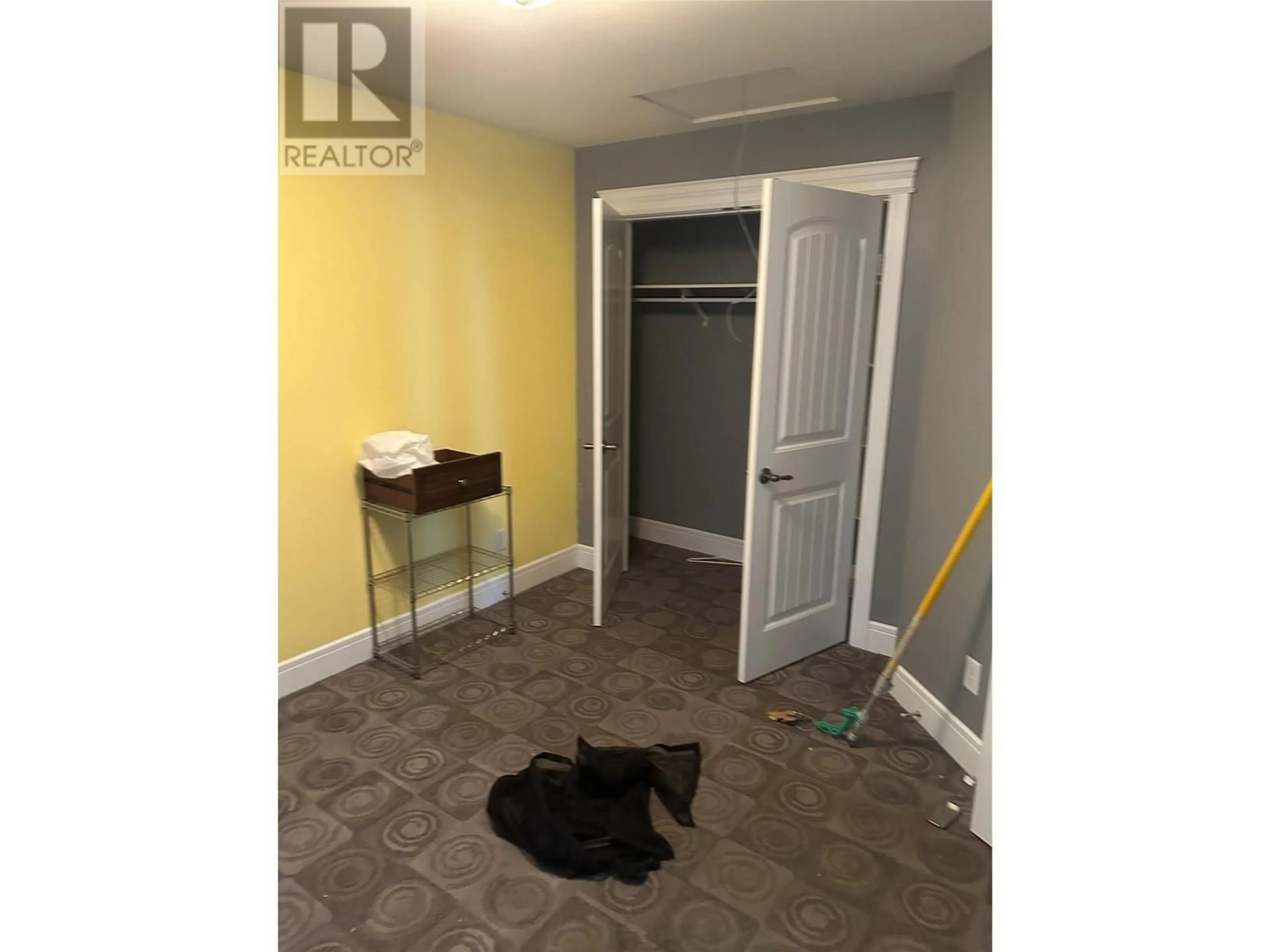 Storage room or clothes room or walk-in closet for 1410 Tanemura Crescent, Kelowna British Columbia V1P1R5