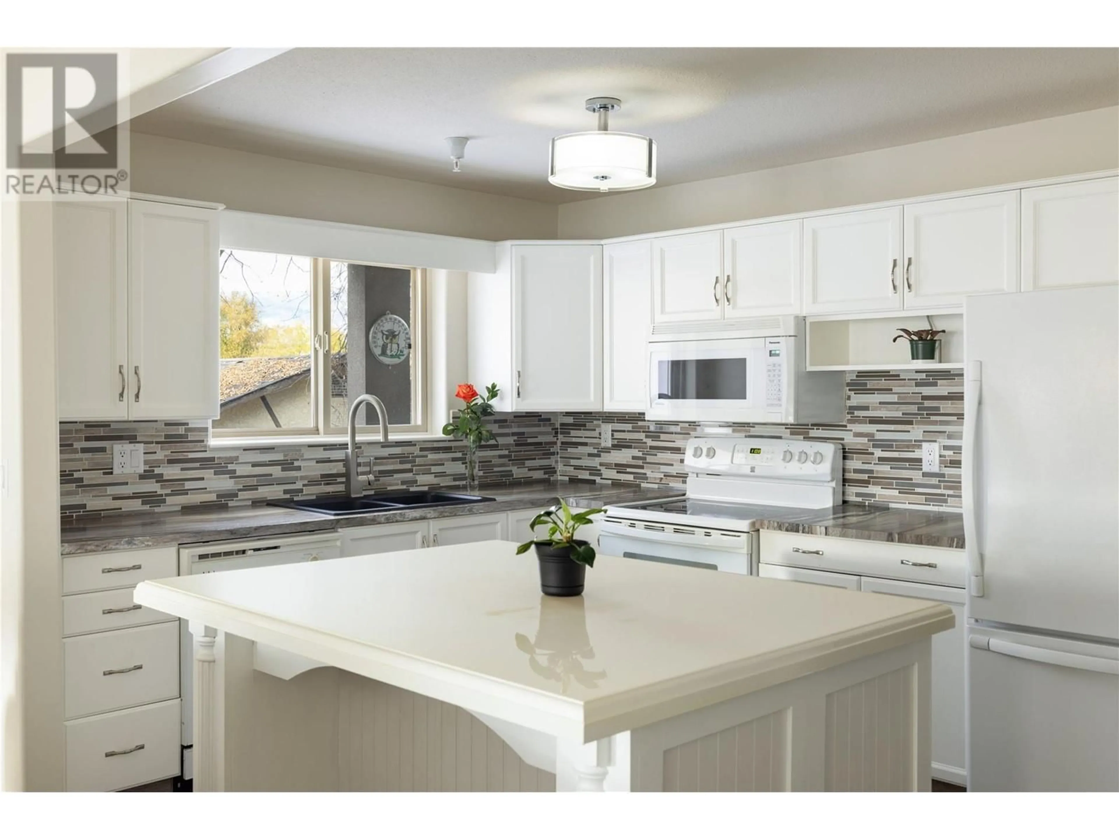 Contemporary kitchen, ceramic/tile floor for 2130 Vasile Road Unit# 102, Kelowna British Columbia V1Y6H5