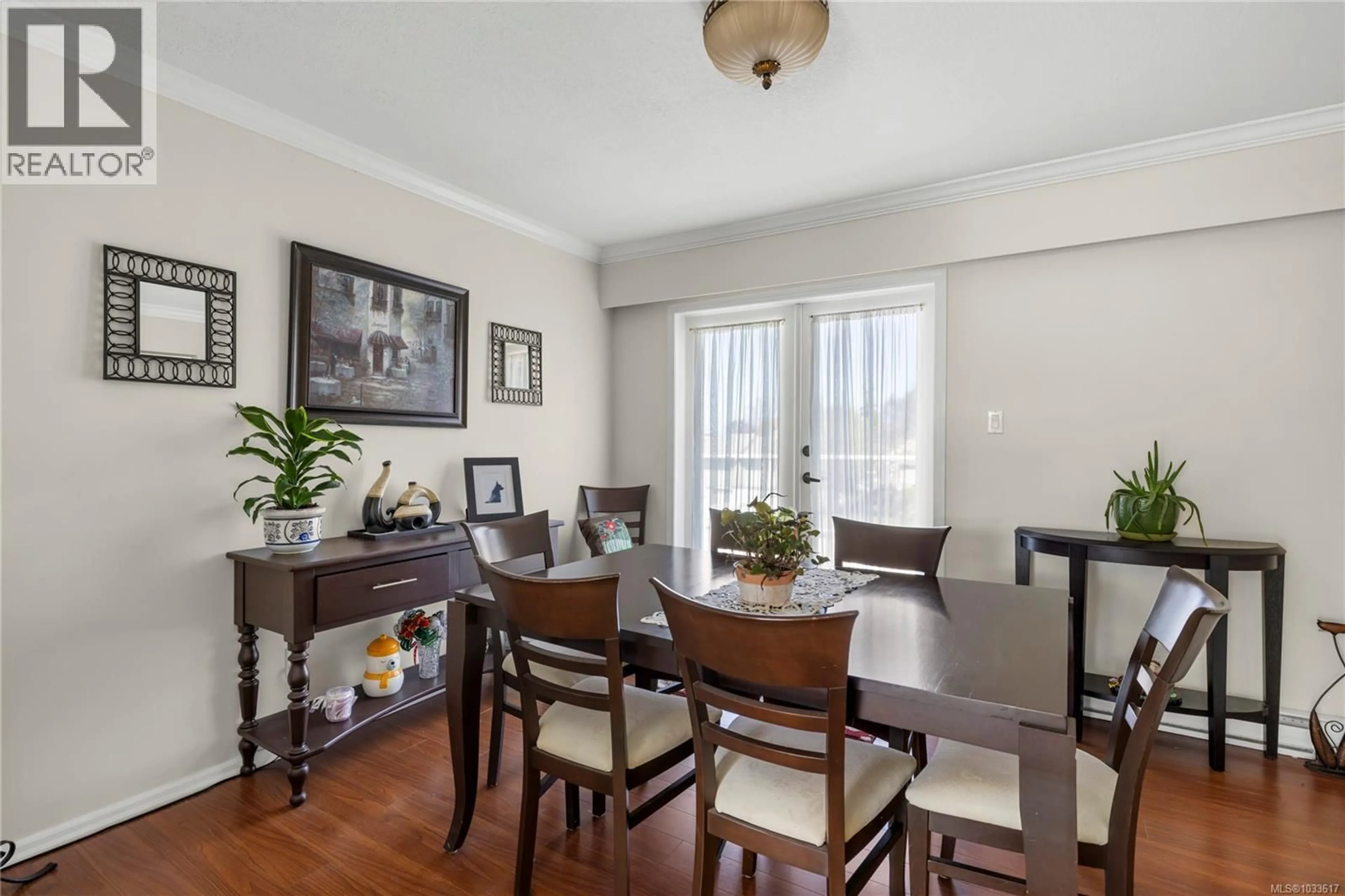 Dining room, wood/laminate floor for 1508 ADMIRAL TRYON BOULEVARD, French Creek British Columbia V9P2V2